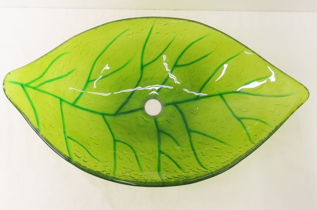 Eden Bath, Green Leaf Shaped Glass Vessel Sink: Eden Bath, Green Leaf Shaped Glass Vessel Sink - 23" Long x 15" Wide x 5" Tall. LOT SIZE: 23x15x5" 13 LBS All information and photos, which are part of the description) are intended to be as accurate
