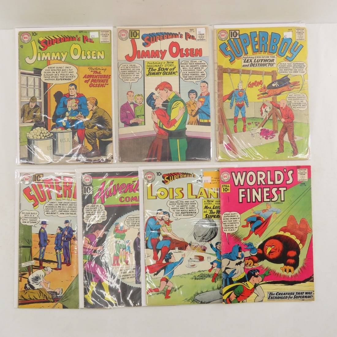 7 Vintage Superman & Superboy Comics: 7 Vintage Superman & Superboy Comics - Superman's Pal, World's Finest, Superman's Lois Lane, Superboy, Adventure Comics. LOT SIZE: 11x9x1" 1 LB All information and photos, which are part of the