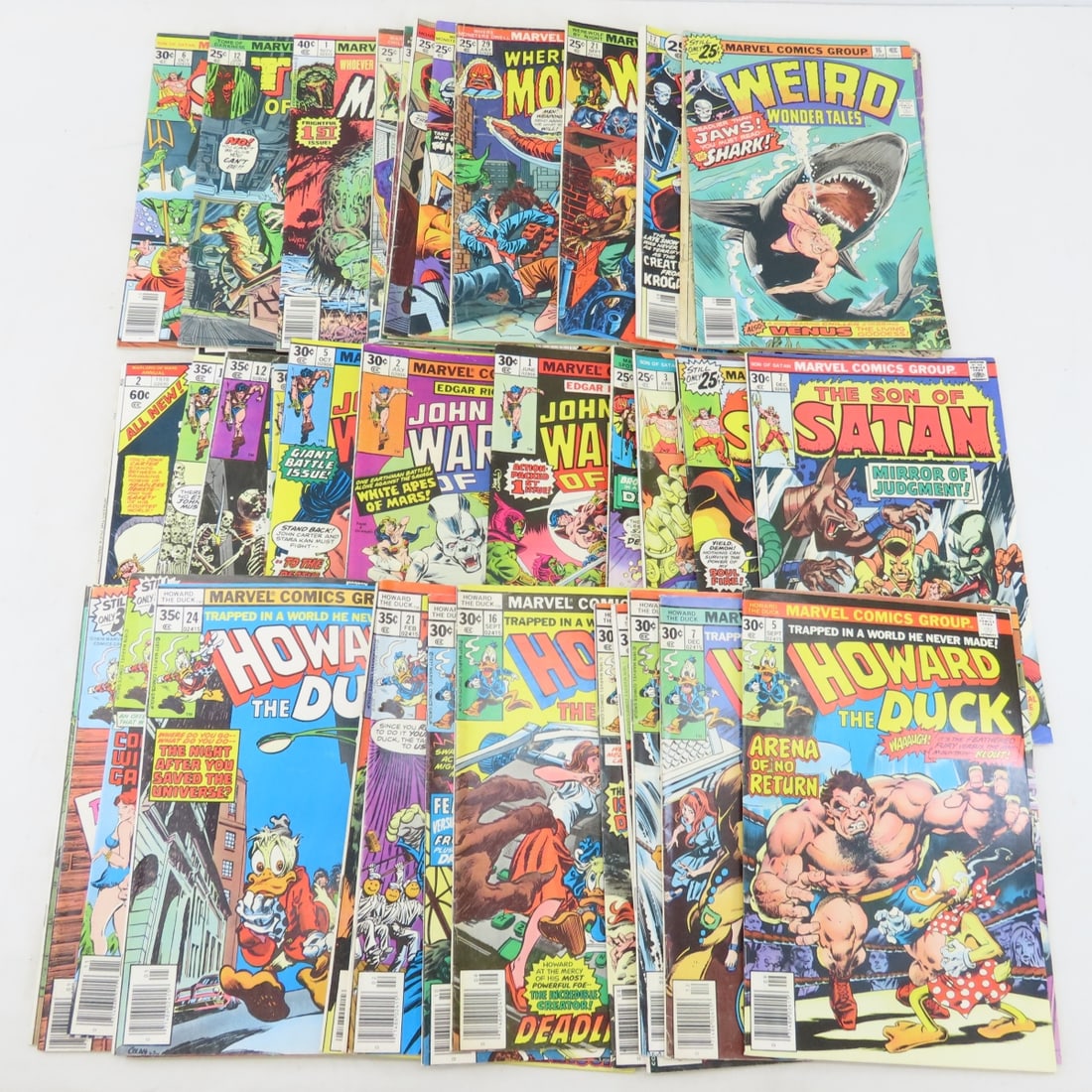 43 25-50 cent Marvel Comics, Howard The Duck: 43 25-50 cent Marvel Comics, Howard The Duck - 18 Howard The Duck, 9 John Carter, 6 Son of Satan, Where Monsters Dwell, Weird Tales & more. LOT SIZE: 11x8x4" 4 LBS All information and photos, which ar