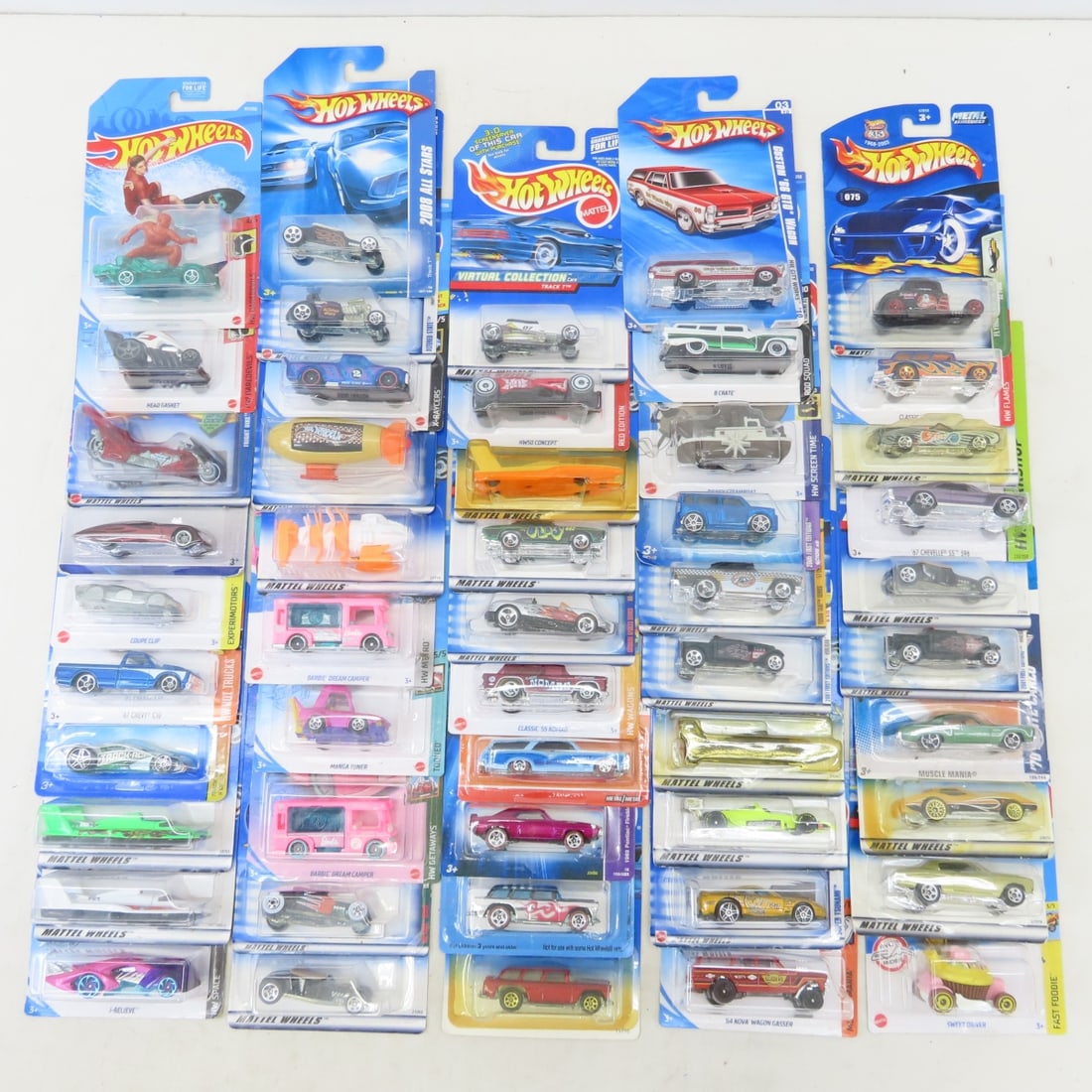 50 1990s & 2000s Hot Wheels Diecast Cars on cards: 50 1990s & 2000s Hot Wheels Diecast Cars on cards - Some Cards will likely have minor damage/bends. LOT SIZE: 10x10x10" 8 LBS All information and photos, which are part of the description) are