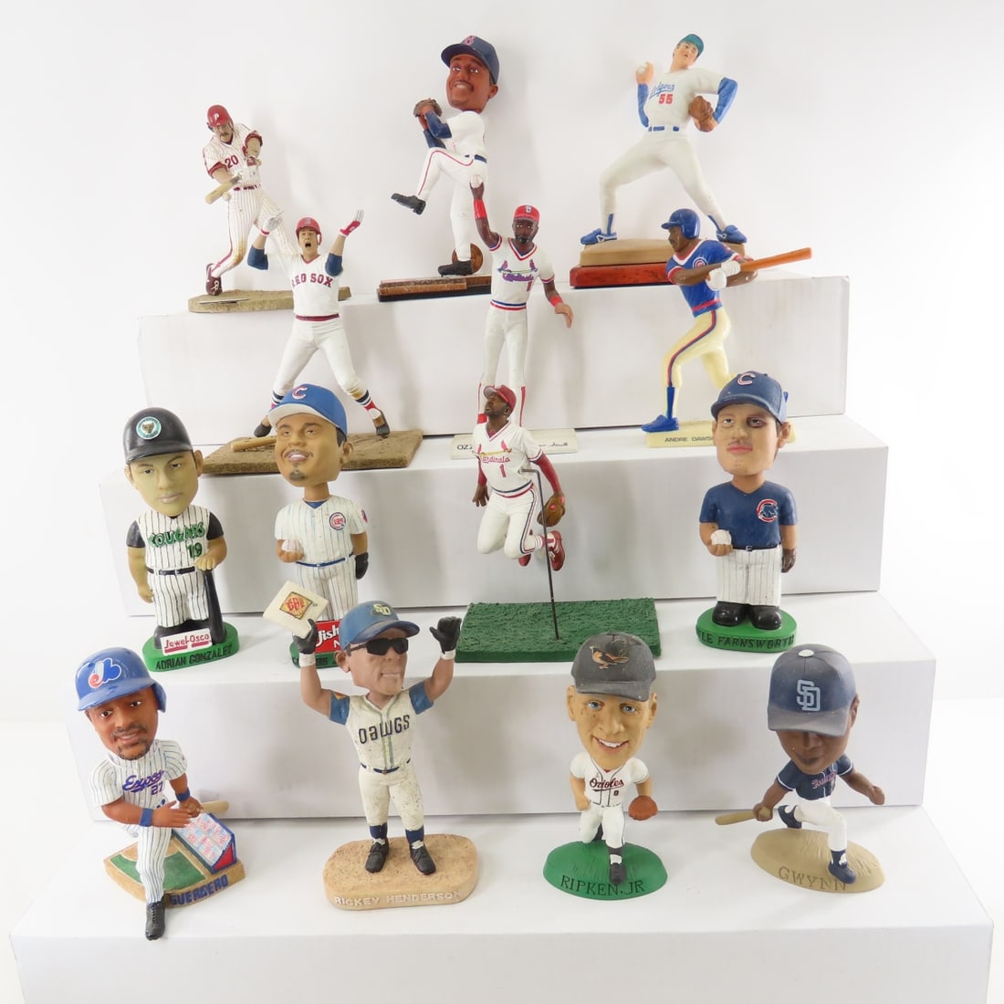 Baseball Bobbleheads and Statues: Baseball Bobbleheads and Statues - resin, ceramic, plastic. LOT SIZE: 12x12x16" 10 LBS All information and photos, which are part of the description, are intended to be as accurate as possible, but