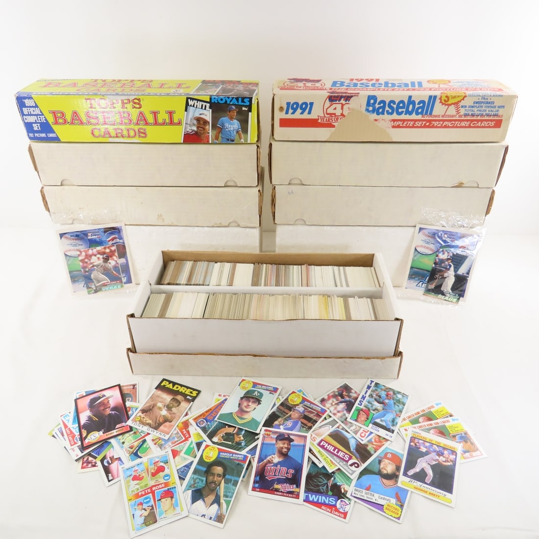 1986-91 Topps & Fleer Baseball Cards: 1986-91 Topps & Fleer Baseball Cards - 6 long boxes and 1 double box. LOT SIZE: 15x12x10" 28 LBS All information and photos, which are part of the description, are intended to be as accurate as