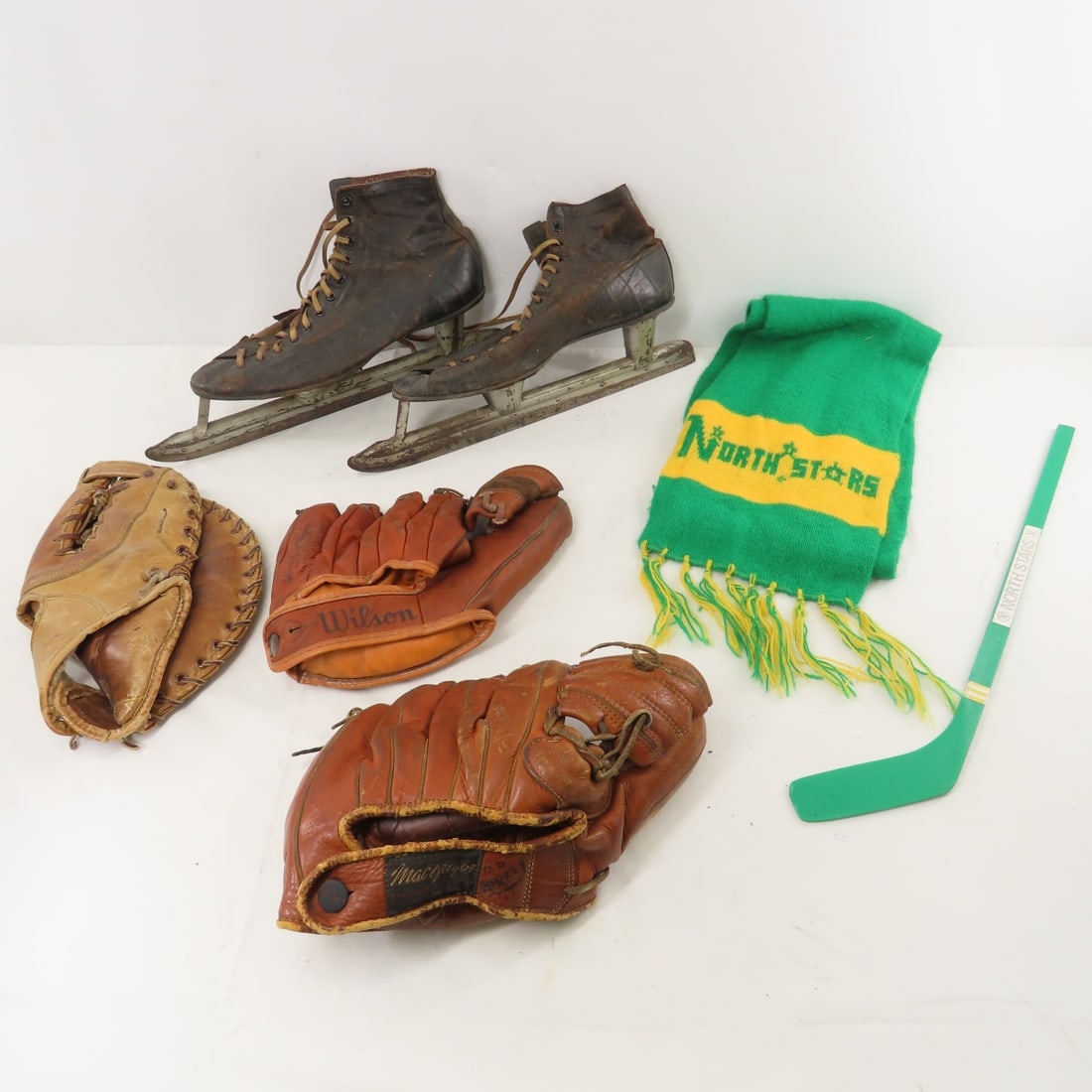 Skates, North Stars Scarf, Baseball Gloves & More: Skates, North Stars Scarf, Baseball Gloves & More - Nestor Johnson North Star men's 9 ice skates, MN North Stars scarf and mini hockey stick, MacGregor G114 baseball glove, Spalding 42-475 Ron Fairly