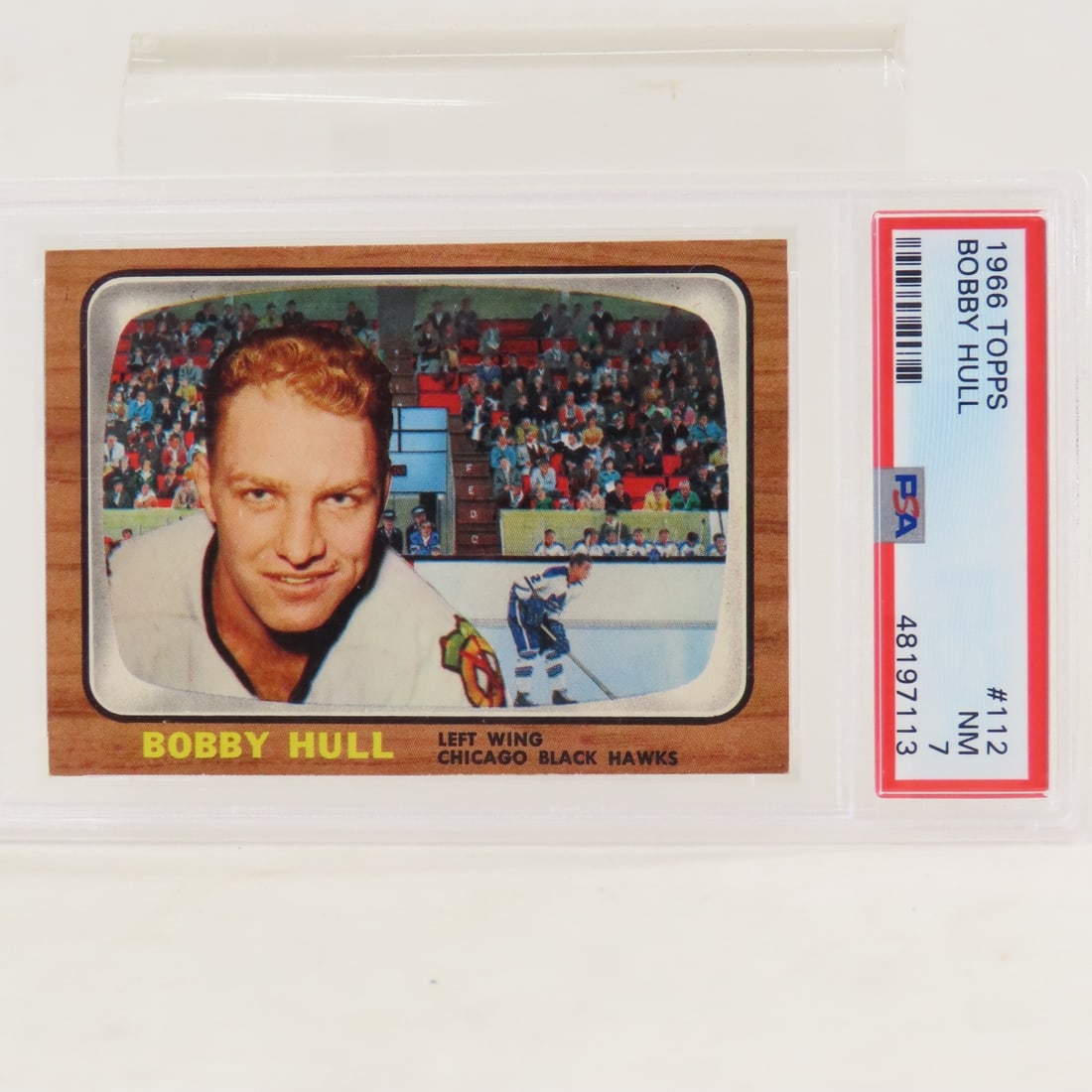 1966 Topps Bobby Hull #112 PSA 7 NM: 1966 Topps Bobby Hull #112 PSA 7 NM - Lot Size 5.5x3.5x.5" 1 LB All information and photos, which are part of the description, are intended to be as accurate as possible, but errors are possible. No