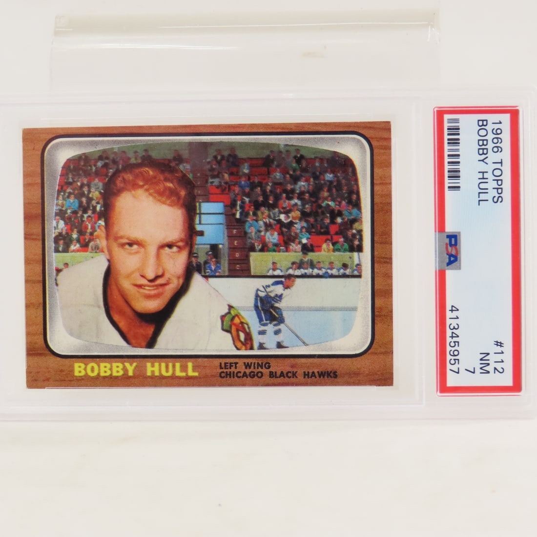 1966 Topps Bobby Hull #112 PSA 7 NM: 1966 Topps Bobby Hull #112 PSA 7 NM - Lot Size 5.5x3.5x.5" 1 LB All information and photos, which are part of the description, are intended to be as accurate as possible, but errors are possible. No i