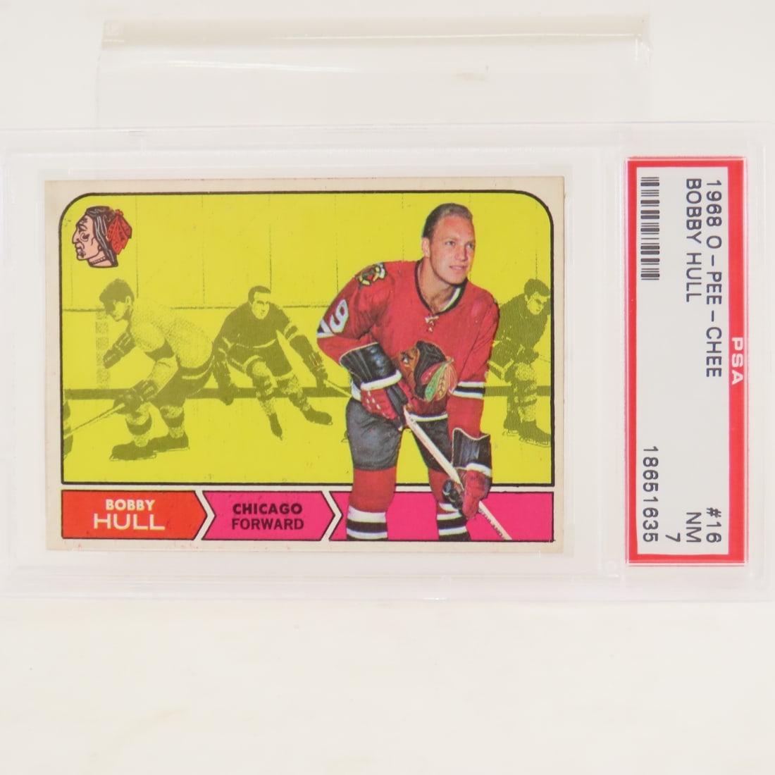 1968 O-PEE-CHEE Bobby Hull #16 PSA 7 NM: 1968 O-PEE-CHEE Bobby Hull #16 PSA 7 NM - Lot Size 5.5x3.5x.5" 1 LB All information and photos, which are part of the description, are intended to be as accurate as possible, but errors are possible.