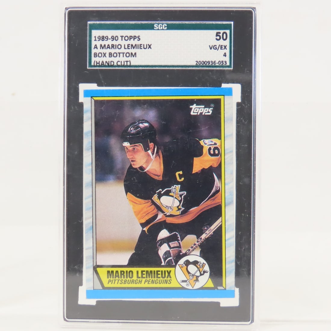 1989 OPC Box Bottoms Mario Lemieux #A SGC 50 VG/EX: 1989 OPC Box Bottoms Mario Lemieux #A SGC 50 VG/EX - Lot Size 5.5x3.5x1" 1 LB All information and photos, which are part of the description, are intended to be as accurate as possible, but errors are