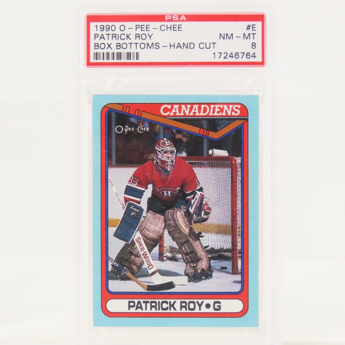 1990 O-PEE-CHEE Box Bottoms Patrick Roy #E PSA 8: 1990 O-PEE-CHEE Box Bottoms Patrick Roy #E PSA 8 - Lot Size 5.5x3.5x1" 1 LB All information and photos, which are part of the description, are intended to be as accurate as possible, but errors are
