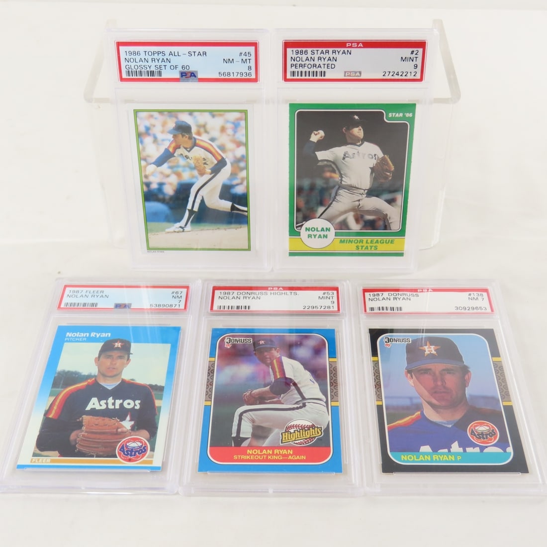 5 PSA Graded Nolan Ryan Cards 1986 - 1987: 5 PSA Graded Nolan Ryan Cards 1986 - 1987 - 1986 Topps All Star Glossy Nolan Ryan #45 PSA 8 NM-MT, 1986 Star Ryan Nolan Ryan Perforated #2 PSA 9 MINT, 1987 Fleer Nolan Ryan #67 PSA 7 NM, 1987 Donruss 