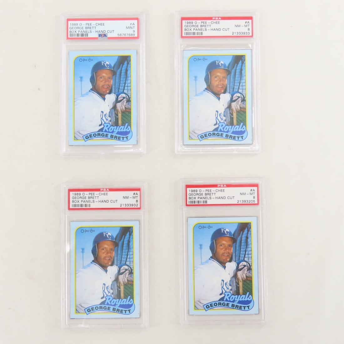 4 1989 O-PEE-CHEE Box Panels George Brett #A PSA: 4 1989 O-PEE-CHEE Box Panels George Brett #A PSA - 1 PSA 9 MINT & 3 PSA 8 NM-MT. Lot Size 5.5x3.5x1" 1 LB All information and photos, which are part of the description, are intended to be as accurate