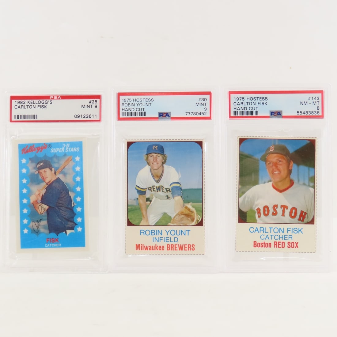 1975 Hostess Robin Yount & Carlton Fisk PSA & more: 1975 Hostess Robin Yount & Carlton Fisk PSA & more - 1975 Hostess Robin Yount #80 PSA 9 MINT, 1975 Hostess Carlton Fisk #143 PSA 8 NM-MT, 1982 Kellogg's Carlton Fisk #25 PSA 9 MINT. Lot Size