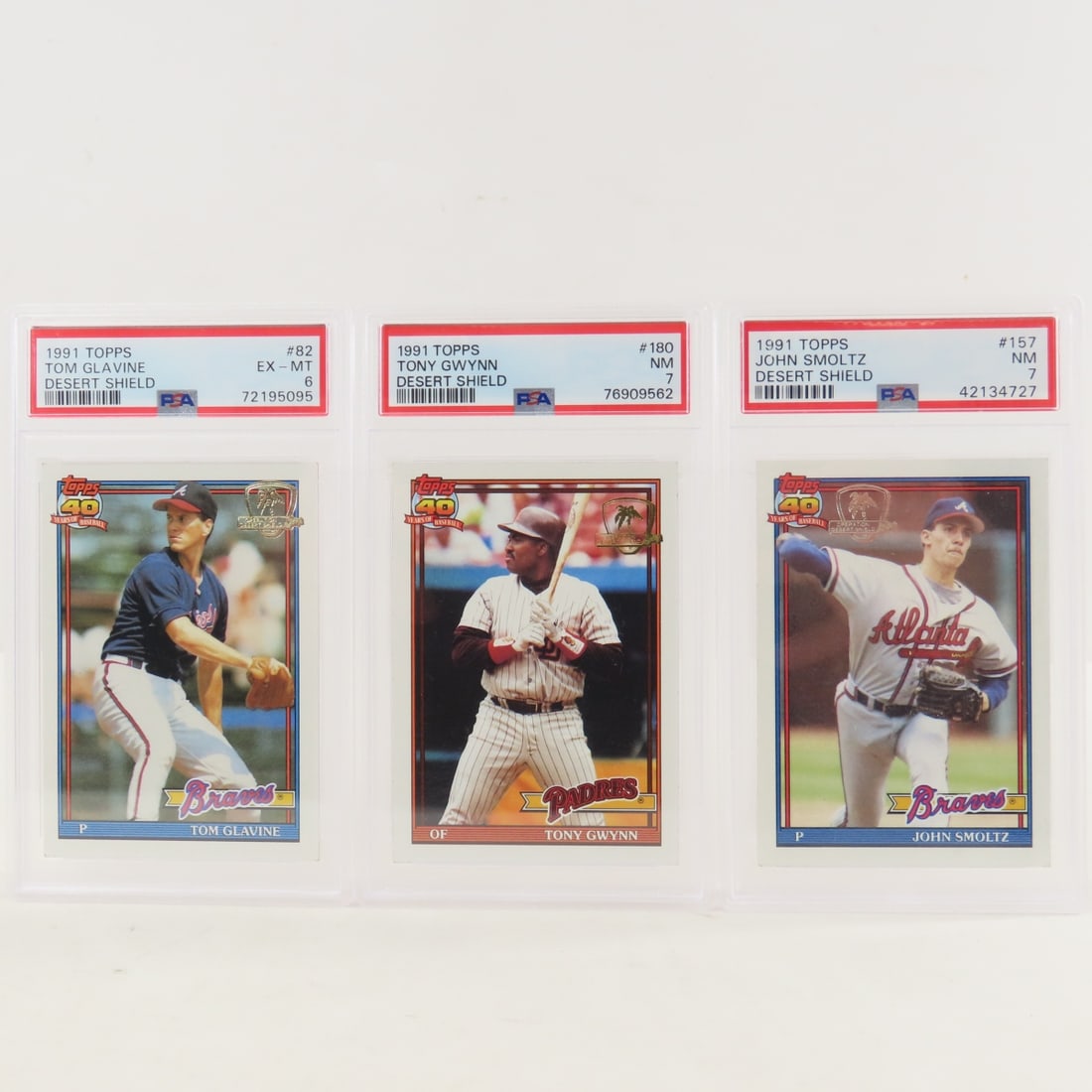 3 PSA 1991 Topps Desert Shield Baseball cards: 3 PSA 1991 Topps Desert Shield Baseball cards - Tom Glavine #82 PSA 6 EX-MT, Tony Gwynn #180 PSA 7 NM, & John Smoltz #157 PSA7 NM. Lot Size 5.5x3.5x1" 1 LB All information and photos, which are part o