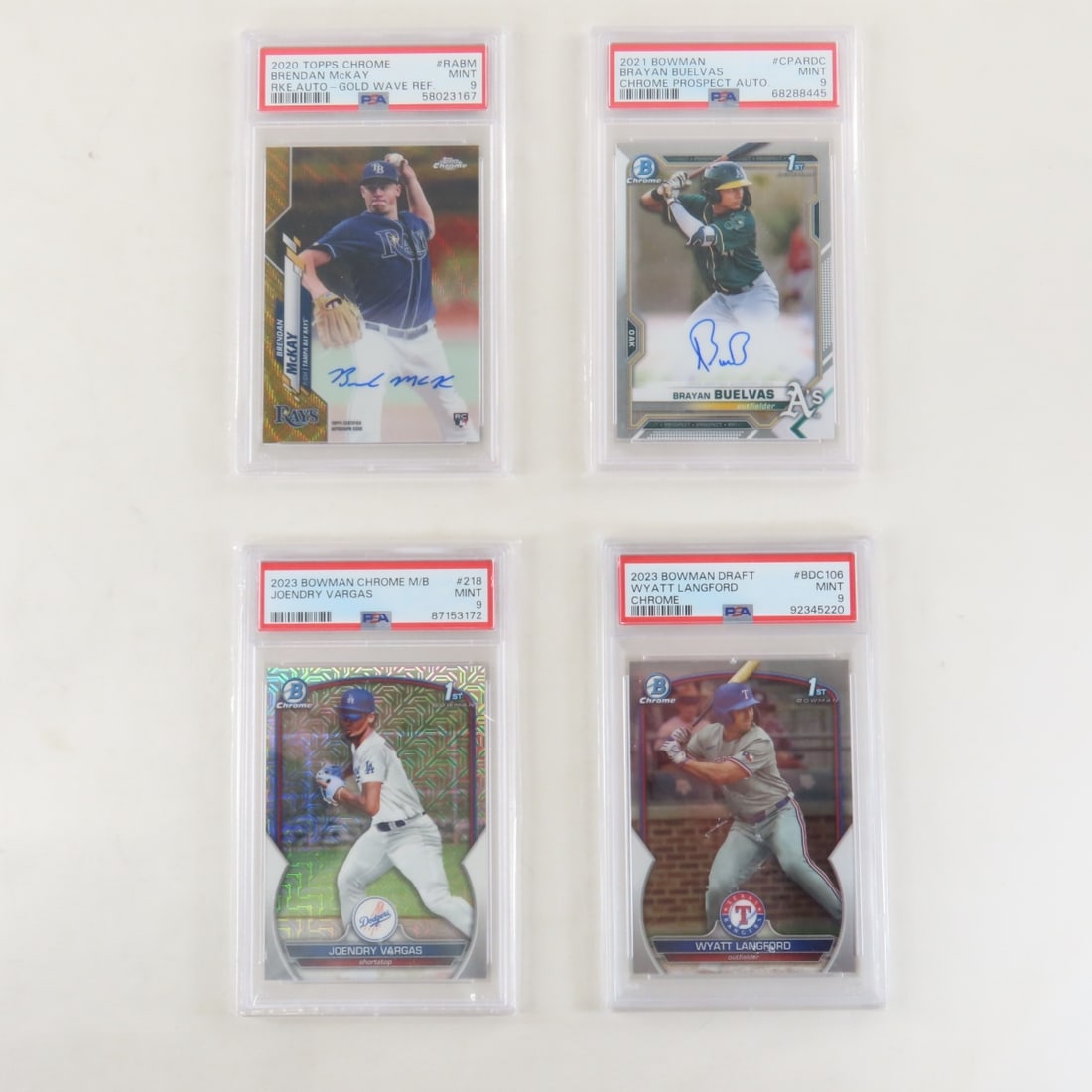 4 PSA Graded Baseball Cards 2020-2023: 4 PSA Graded Baseball Cards 2020-2023 - 2020 Topps Chrome Brendan McKay RKE. Autograph- Gold Wave REF. #RABM PSA Mint 9, 2021 Bowman Brayan Buelvas Chrome Prospect Autograph #CPARDC PSA Mint 9, 2023 B