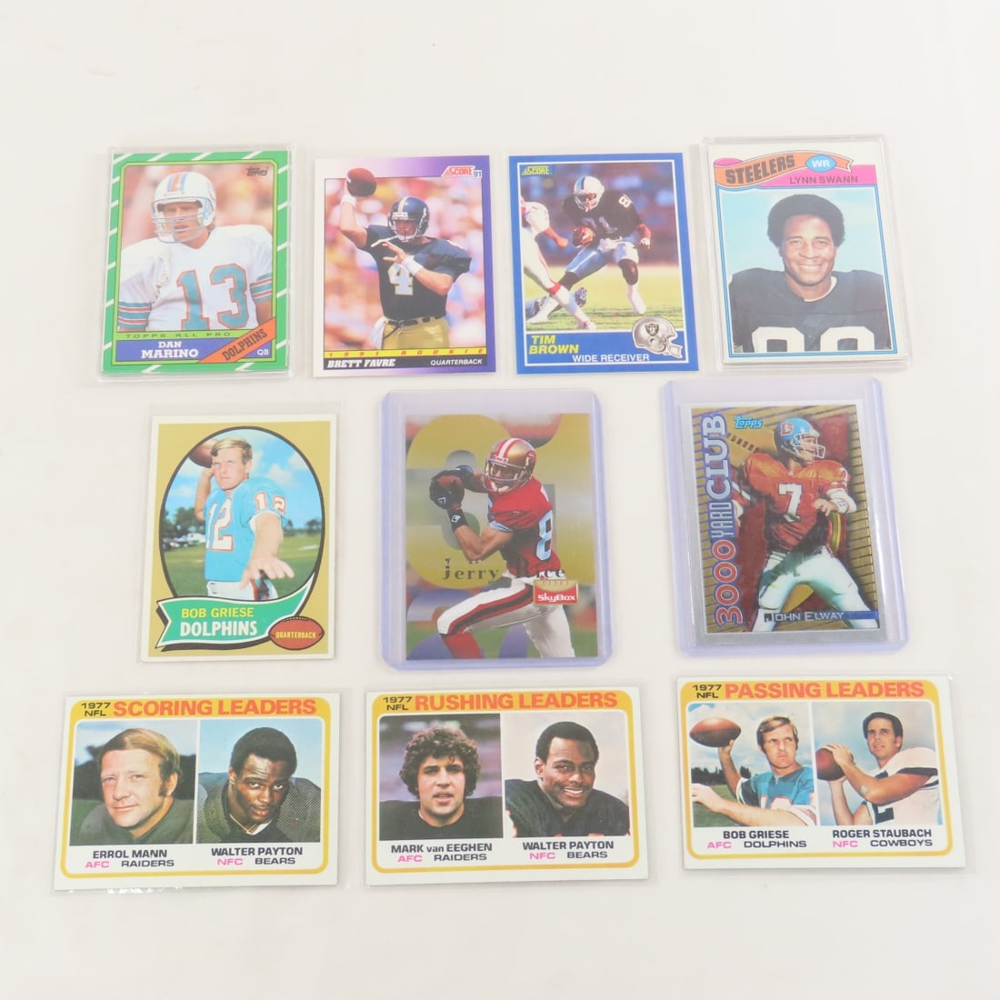 10 Sharp NFL Rookie & HOFer's Topps Cards: 10 Sharp NFL Rookie & HOFer's Topps Cards - Favre, Elway, Rice, Marino, Brown, ,Swann, Griese, Mann/Payton, Van Eeghen/Payton, Griese/Stubach. LOT SIZE: 4x3x1" 1 LB All information and photos, which