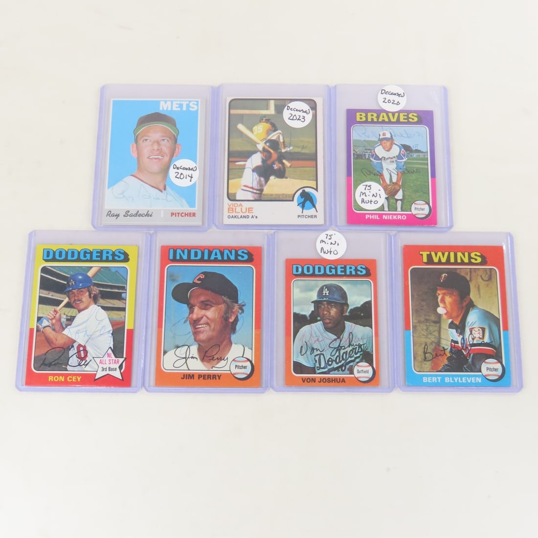 7 Autographed 1970-75 Topps Baseball Cards: 7 Autographed 1970-75 Topps Baseball Cards - Sadecki- deceased 2014, Blue- deceased 2023, Niekro (mini card) - deceased 2020, Cey, Perry, Joshua (mini card), Blyleven. LOT SIZE: 4x3x1" 1 LB All