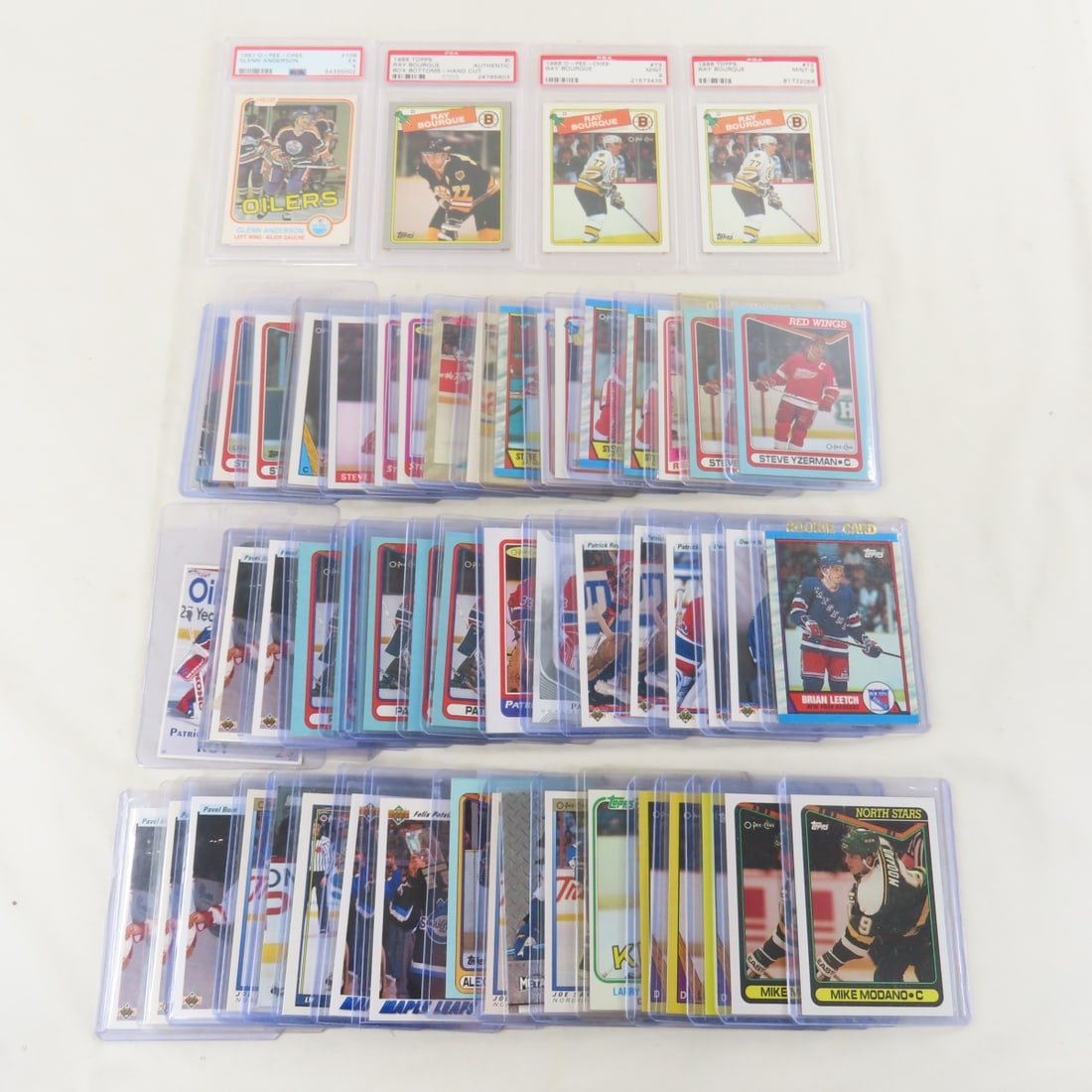 1980s & 90s Star Hockey Cards, 4 PSA Graded: 1980s & 90s Star Hockey Cards, 4 PSA Graded - LOT SIZE: 8x6x4" 3 LBS All information and photos, which are part of the description, are intended to be as accurate as possible, but errors are