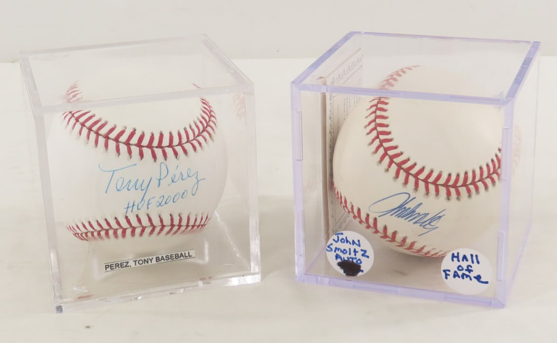 John Smoltz & Tony Perez Signed Baseballs: John Smoltz & Tony Perez Signed Baseballs - John Smoltz Atlanta Braves HOF'er signed NL ball in case, Tony Perez HOF 2000 signed MLB ball with Spence sticker in case. LOT SIZE: 7x4x4" , 1 LB All infor