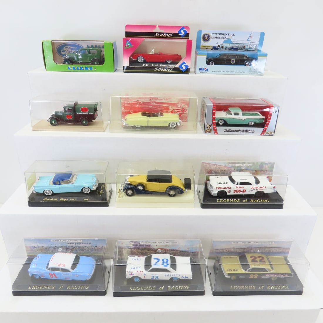Collection of 1:43 & Other Diecast Cars, Legends: Collection of 1:43 & Other Diecast Cars, Legends - Legends of Racing, Solido, Road Signature, Elicor, Daron. LOT SIZE: 12x12x10" All information and photos, which are part of the description, are