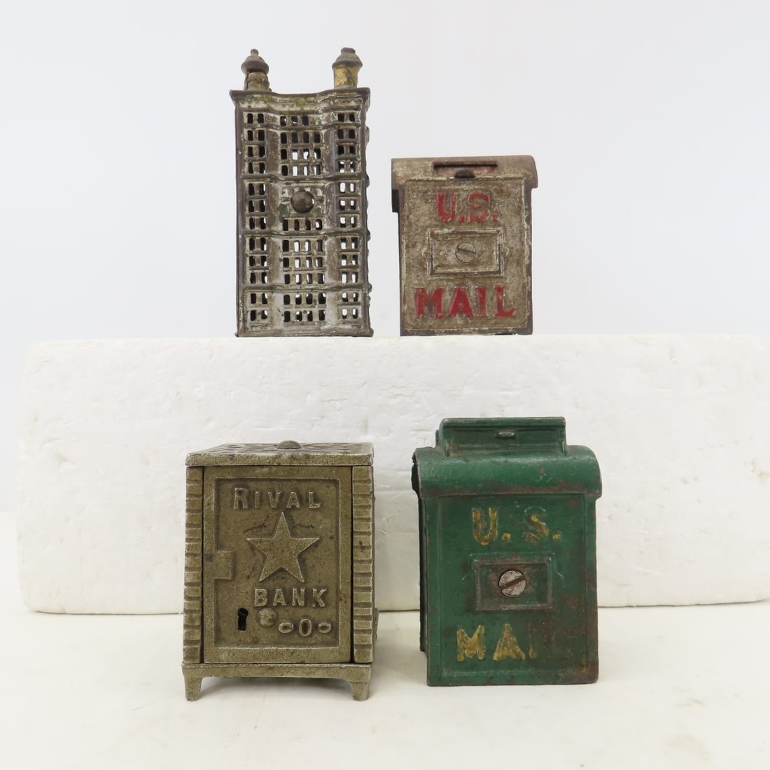 4 Cast Iron US Mail, Rival & Other Banks: 4 Cast Iron US Mail, Rival & Other Banks - 2 US Mail, Rival, AC Williams Building. 6x6x4" 4 LBS All information and photos, which are part of the description, are intended to be as accurate as po