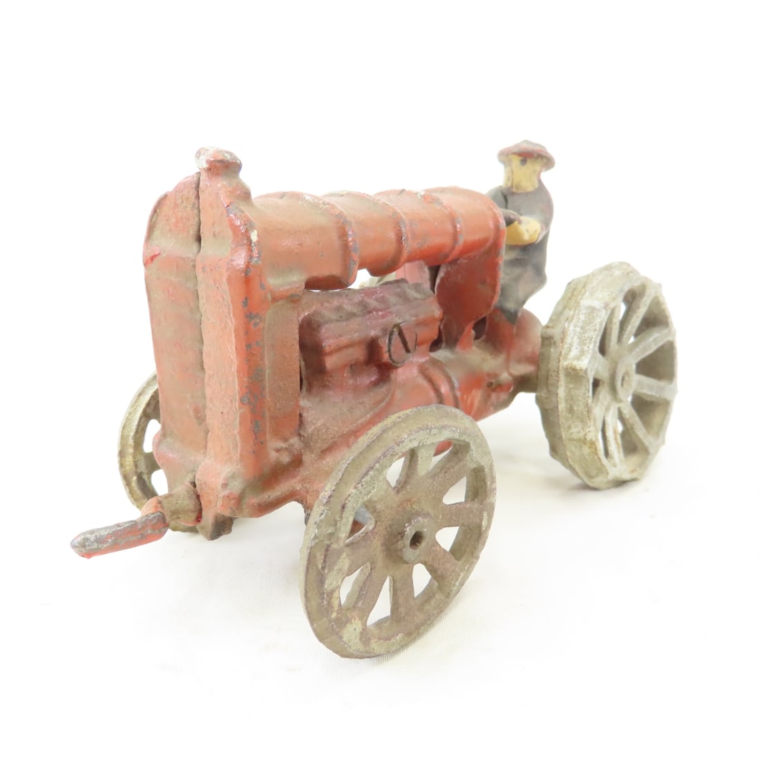 Antique Arcade Cast Iron Fordson Tractor & Driver: Antique Arcade Cast Iron Fordson Tractor & Driver - Rear Wheels & Axle Are Loose. LOT SIZE: 6x4x3" 2 LBS All information and photos, which are part of the description, are intended to be as accurate&#