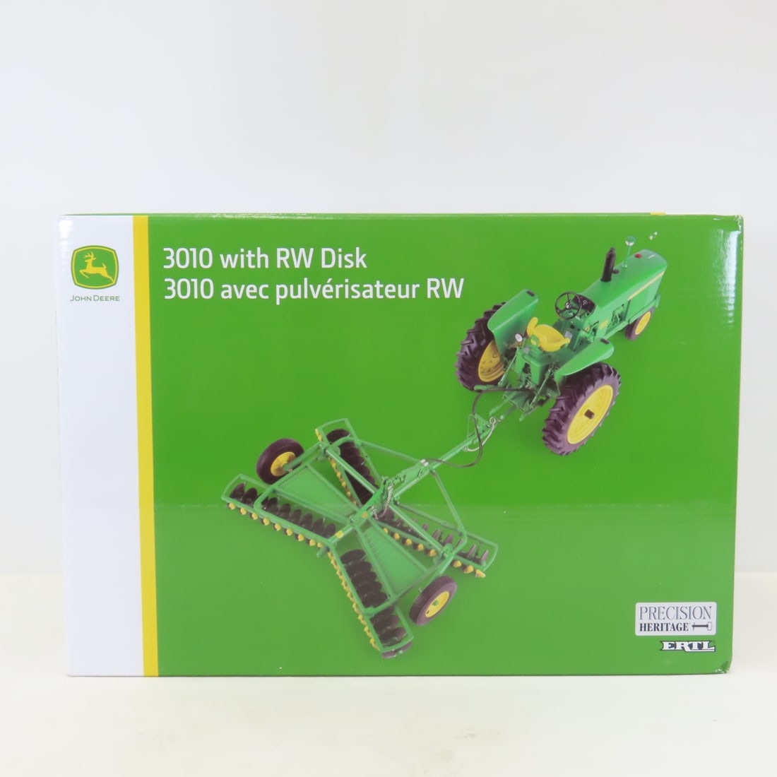 ERTL 1:16 John Deere 3010 Tractor with RW Disk: ERTL 1:16 John Deere 3010 Tractor with RW Disk - Diecast Metal Precision Heritage. sealed box, LOT SIZE: 16x11x7" 6 LBS All information and photos, which are part of the description, are intended to