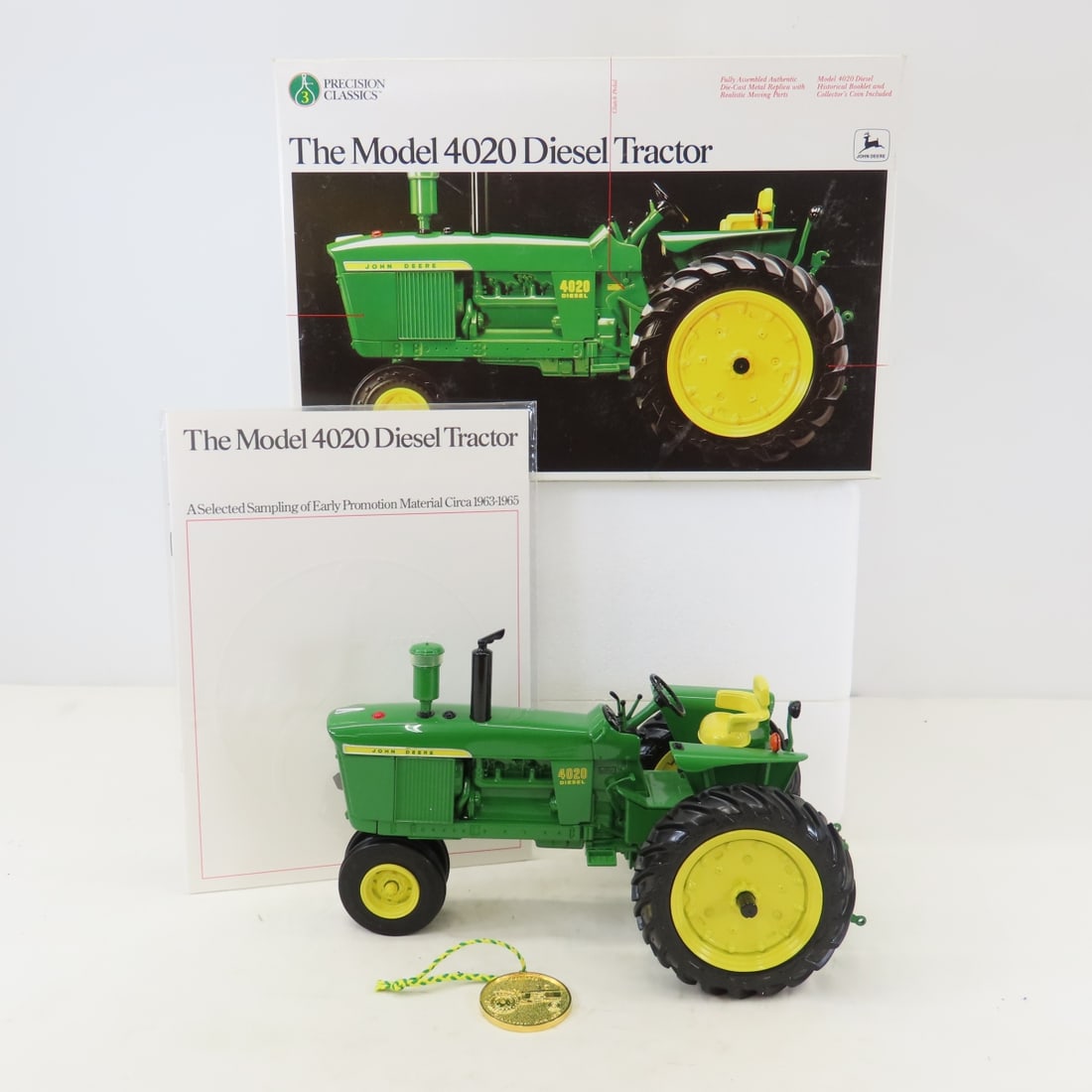 ERTL Precision 1:16 John Deere 4020 Diesel Tractor: ERTL Precision 1:16 John Deere 4020 Diesel Tractor - Diecast Metal. Precision Classics with Coin and booklet in box. LOT SIZE: 12x9x9" 7 LBS All information and photos, which are part of the