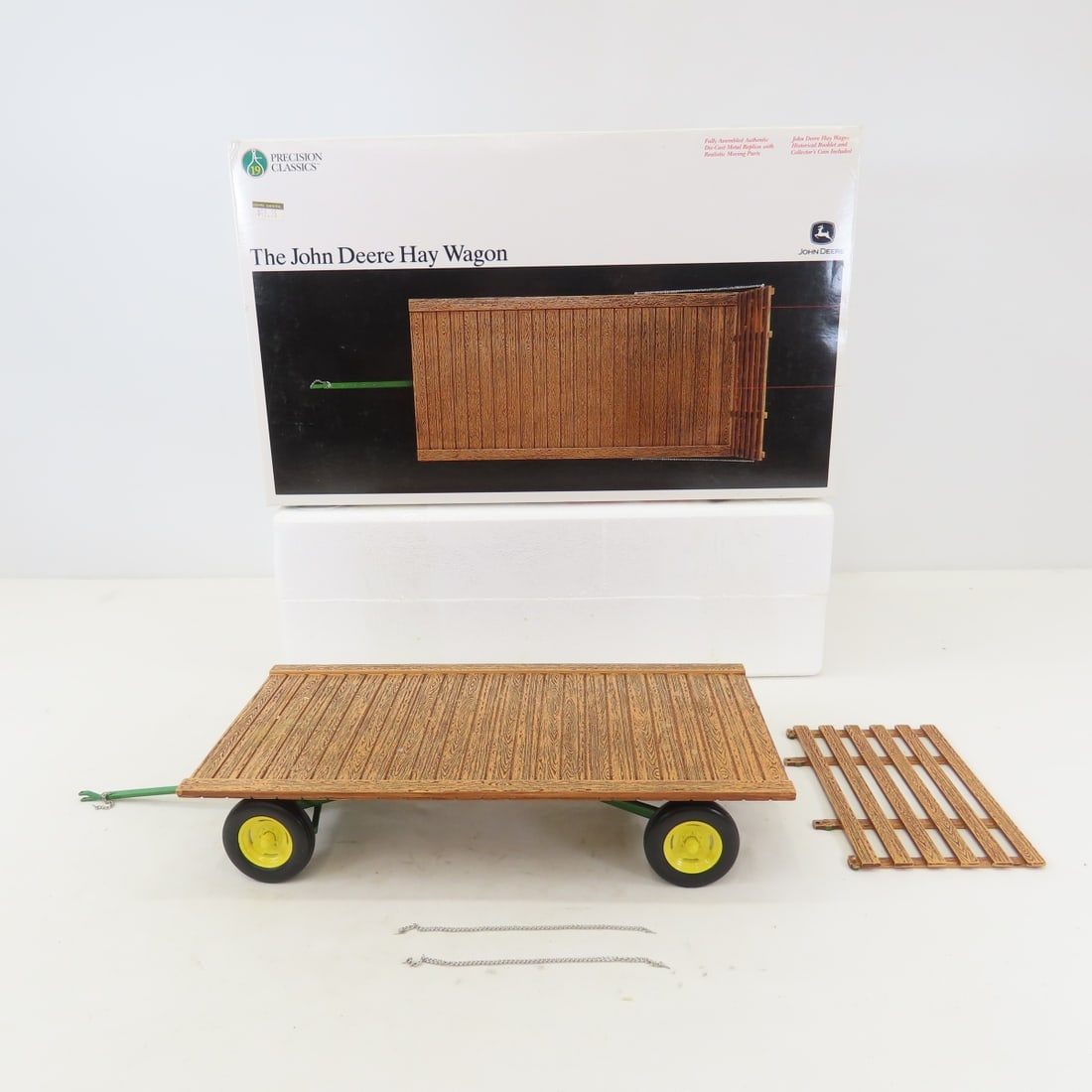 ERTL Precision 1:16 John Deere Hay Wagon: ERTL Precision 1:16 John Deere Hay Wagon - Diecast Metal. Precision Classics, no coin, in box. LOT SIZE: 14x9x5" 3 LBS All information and photos, which are part of the description, are intended to