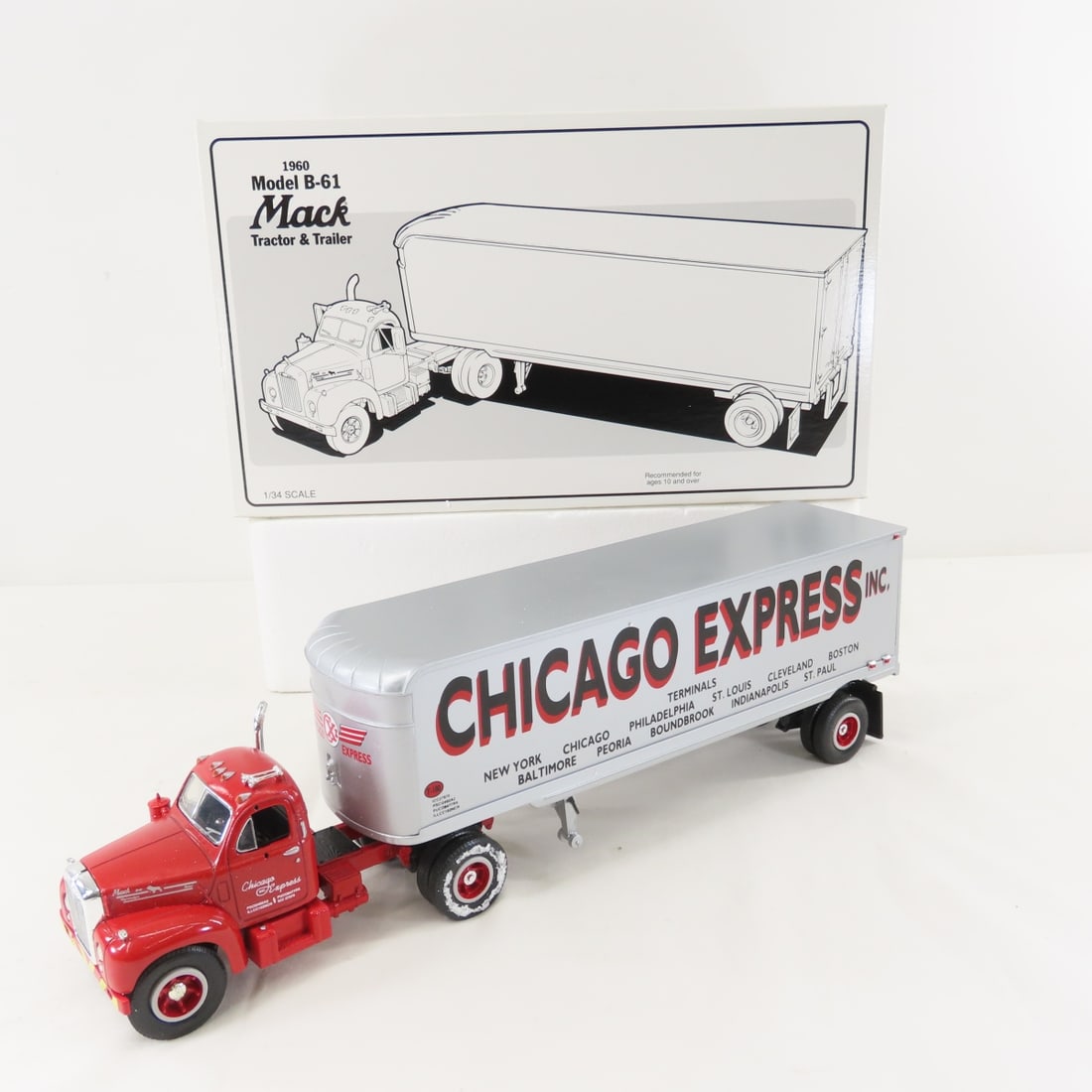 1st Gear 1:34 Chicago Mack B-61 Tractor Trailer: 1st Gear 1:34 Chicago Mack B-61 Tractor Trailer - Diecast Metal Chicago Express 19-1667 1960 Tractor & Trailer. Has original shipping box. LOT SIZE: 13x8x4" 2 LBS All information and photos, which