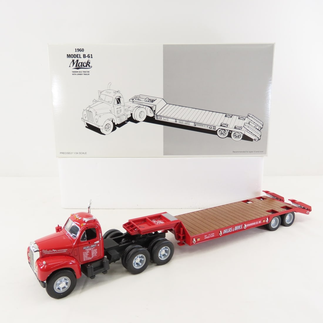 1st Gear 1:34 Dallas Mavis Mack B-61 Tractor: 1st Gear 1:34 Dallas Mavis Mack B-61 Tractor - Diecast Metal 19-2161 Tandem Axle Tractor with Lowboy Trailer. Has original shipping box. LOT SIZE: 15x8x4" 2 LBS All information and photos, which are