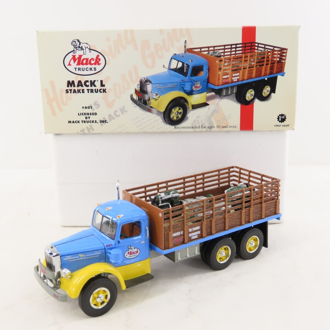 1st Gear 1:34 Diecast Mack 'L' Stake Truck #601: 1st Gear 1:34 Diecast Mack 'L' Stake Truck #601 - Diecast Metal 19-3155. LOT SIZE: 11x5x5" 2 LBS All information and photos, which are part of the description, are intended to be as accurate as