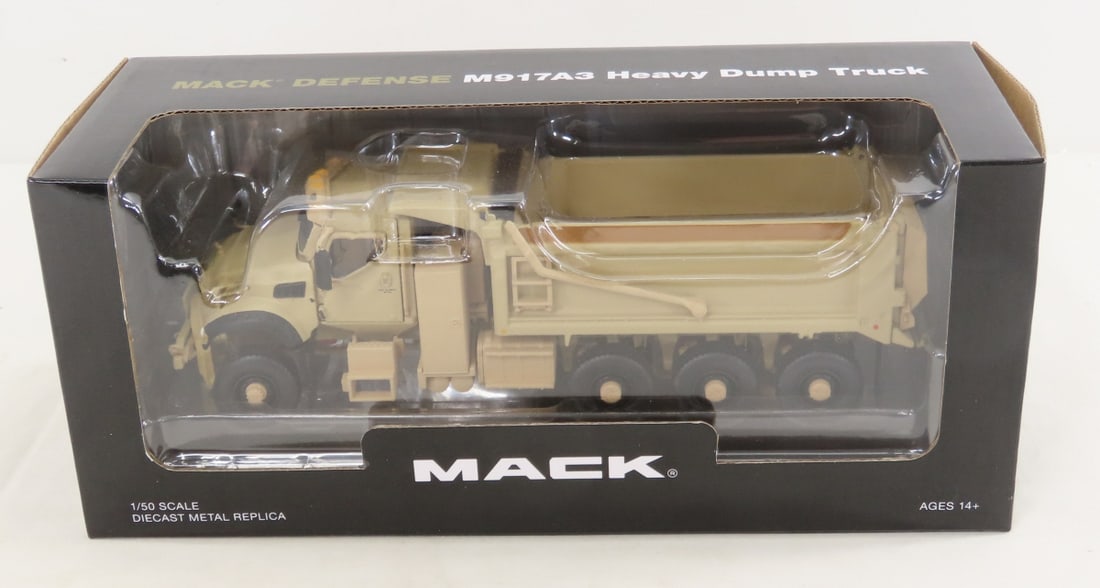 1st Gear 1:50 Mack Defense M917A3 Tan Dump Truck: 1st Gear 1:50 Mack Defense M917A3 Tan Dump Truck - Diecast Metal 50-3495. LOT SIZE: 10x4x4" 1 LB All information and photos, which are part of the description, are intended to be as accurate as