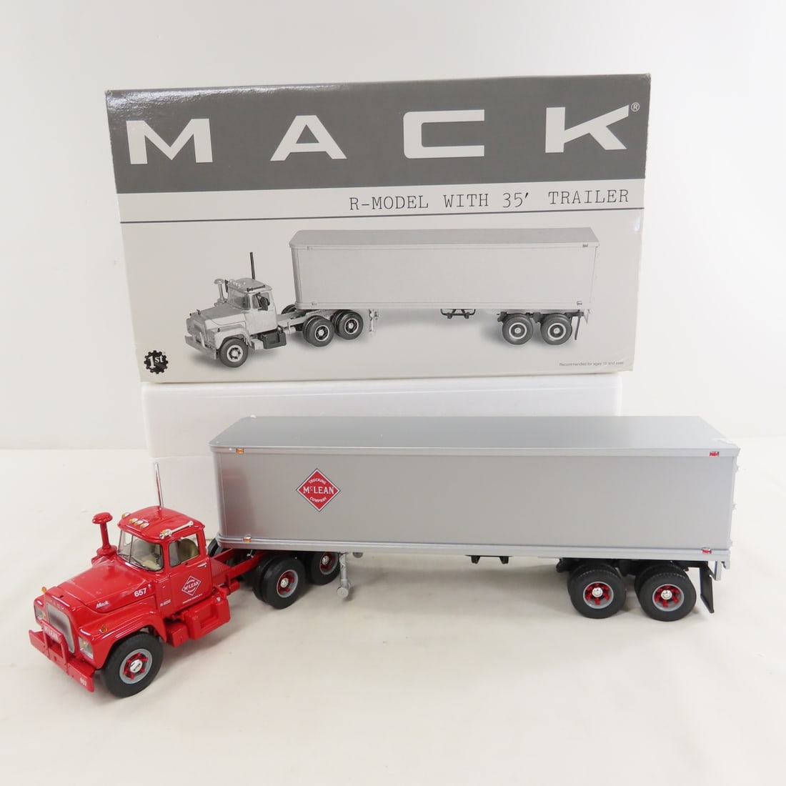 1st Gear 1:34 McLean Mack R-Model w/35' Trailer: 1st Gear 1:34 McLean Mack R-Model w/35' Trailer - Diecast Metal 19-3246. With original shipping box. LOT SIZE: 14x8x5" 3 LBS All information and photos, which are part of the description, are