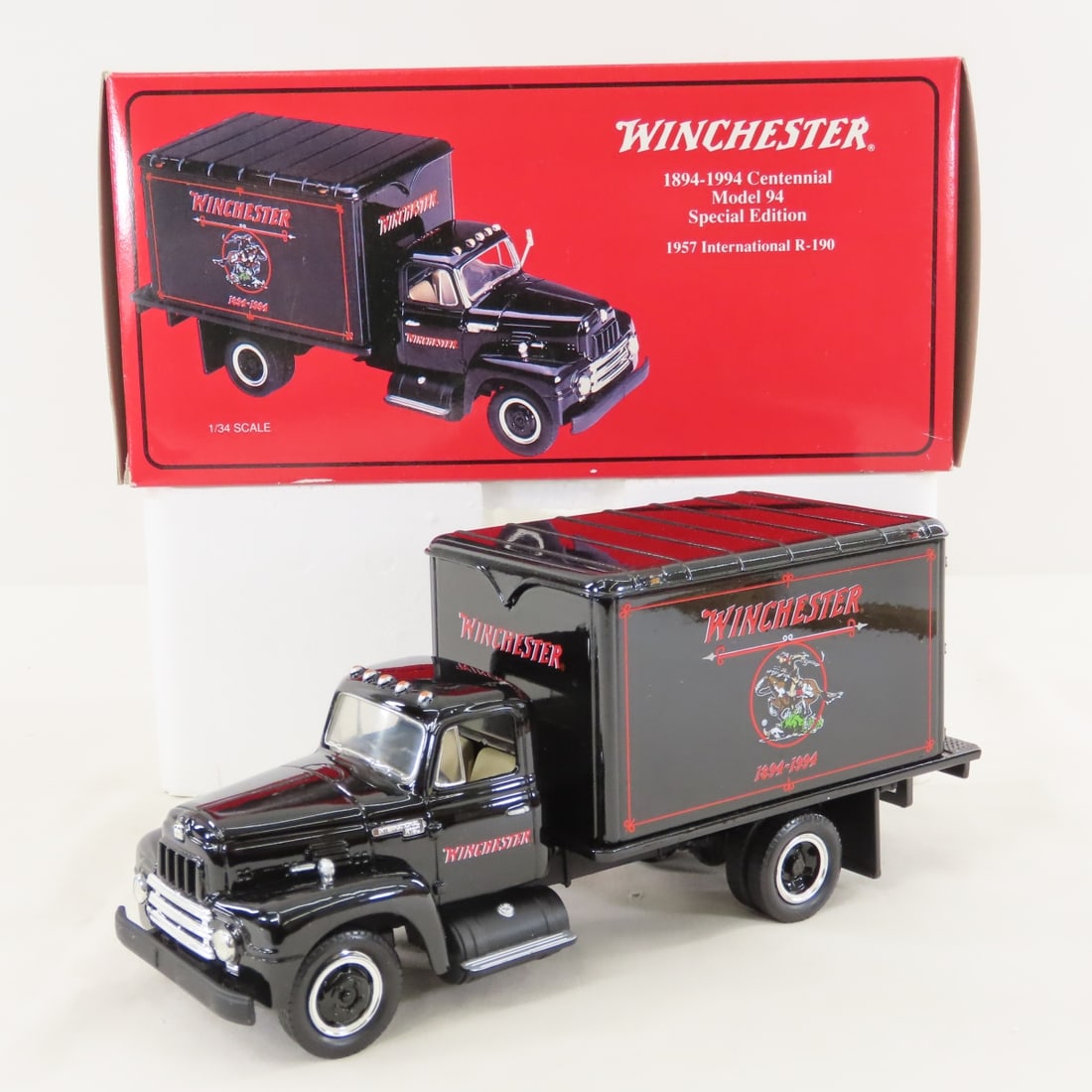 1st Gear 1:34 Winchester 1957 INTL R190 Box Truck: 1st Gear 1:34 Winchester 1957 INTL R190 Box Truck - Diecast Metal 18-1319 1894-1994 Centennial model '94 Anniversary Collector Replica by Toy Collector Club of America. LOT SIZE: 9x5x4" 1 LB All