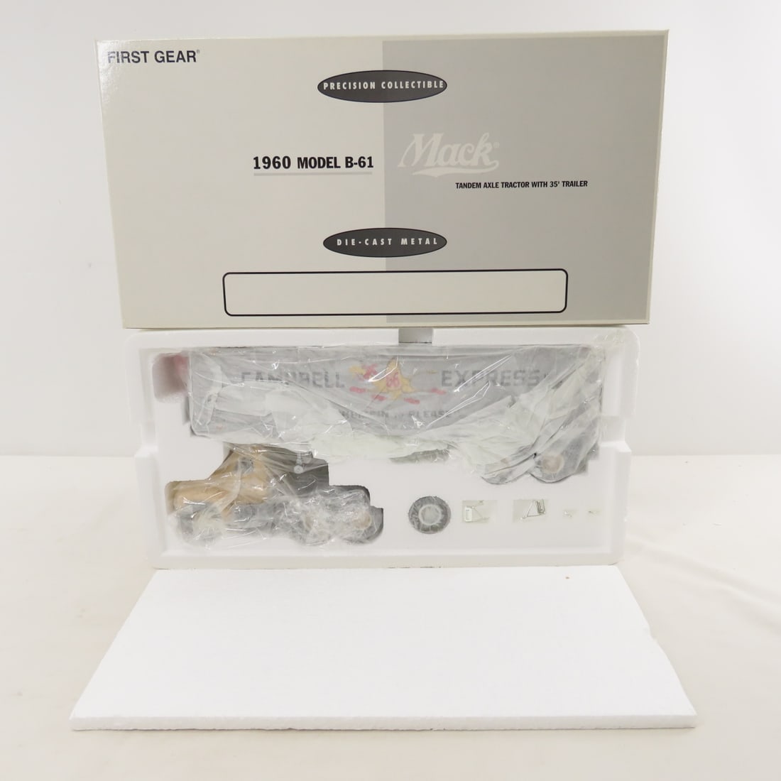 1st Gear Campbell Ex 1960 Mack B61 Tractor Trailer: 1st Gear Campbell Ex 1960 Mack B61 Tractor Trailer - 1:34 Diecast Metal 19-2154. With original shipping box. LOT SIZE: 15x8x4" 3 LBS All information and photos, which are part of the description, are