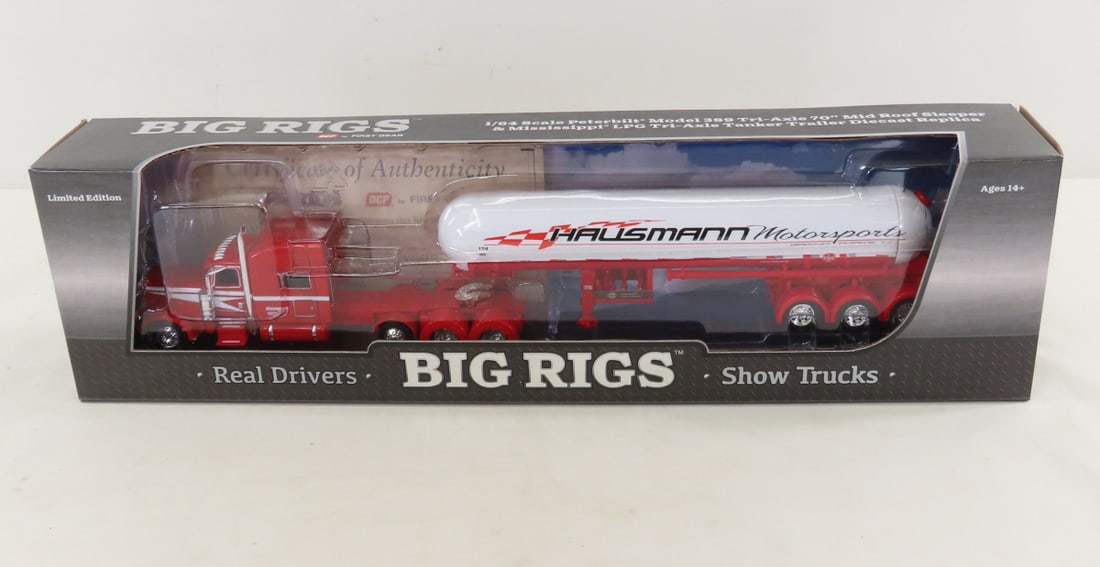 1st Gear 1:64 Hausmann Peterbilt 389 LPG Tanker: 1st Gear 1:64 Hausmann Peterbilt 389 LPG Tanker - Diecast Metal DCP Big Rigs 69-1794 Hausmann Motorsports Tri-Axle Sleeper & Mississippi LPG Tanker Trailer. LOT SIZE: 17x4x3" 1 LB All information and 
