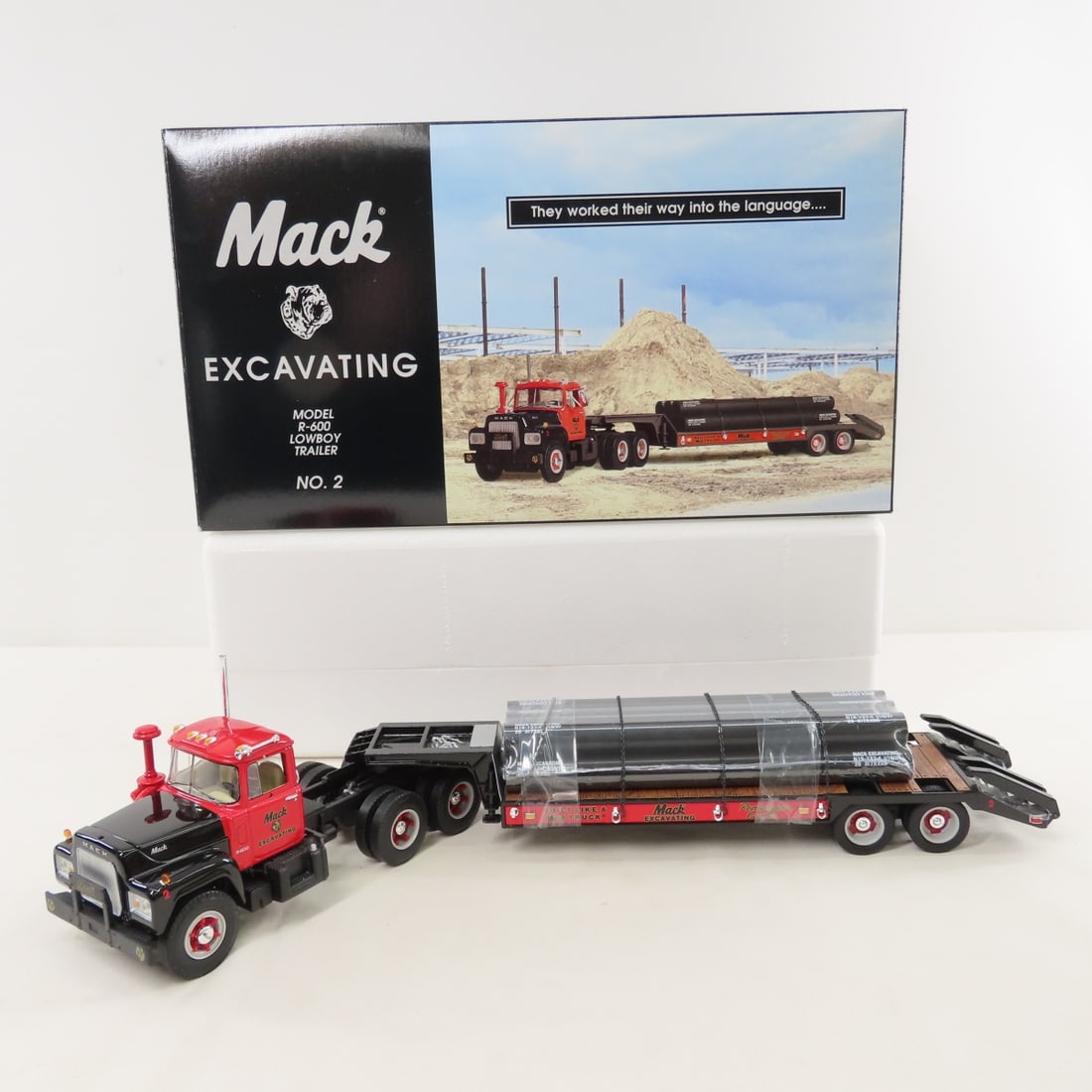 1st Gear 1:34 Mack Excavating R600 Lowboy Trailer: 1st Gear 1:34 Mack Excavating R600 Lowboy Trailer - Diecast Metal 19-2660. With original shipping box. LOT SIZE: 14x8x5" 3 LBS All information and photos, which are part of the description, are