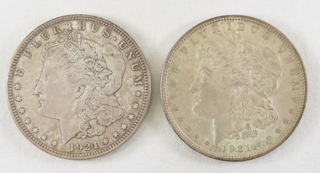 2 1921 Morgan Silver Dollars: 2 1921 Morgan Silver Dollars - LOT SIZE: 2x2x1" 1 LB All information and photos, which are part of the description, are intended to be as accurate as possible, but errors are possible. No item may be