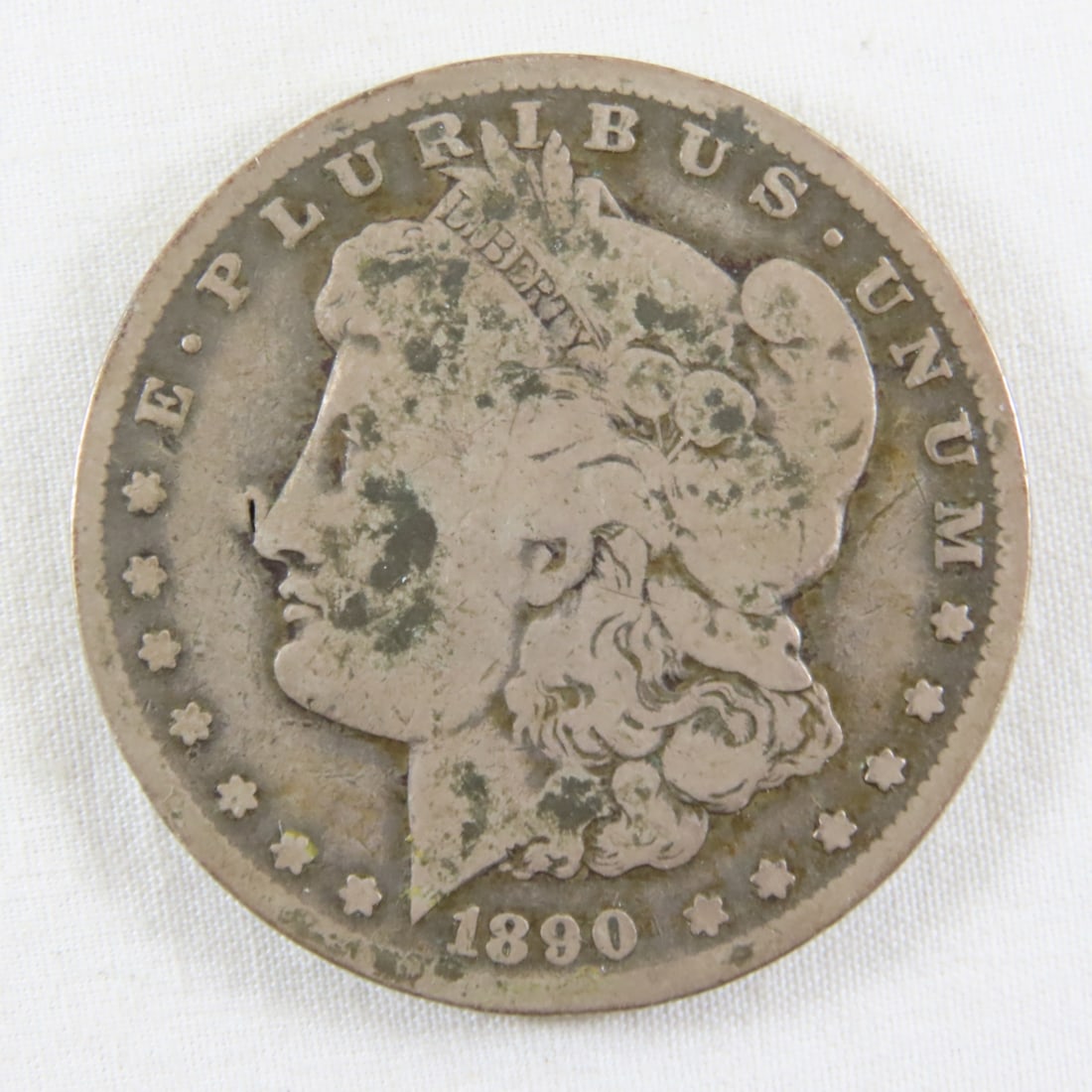1890 O Morgan Silver Dollar: 1890 O Morgan Silver Dollar - LOT SIZE: 2x2x1" 1 LB All information and photos, which are part of the description, are intended to be as accurate as possible, but errors are possible. No item may be