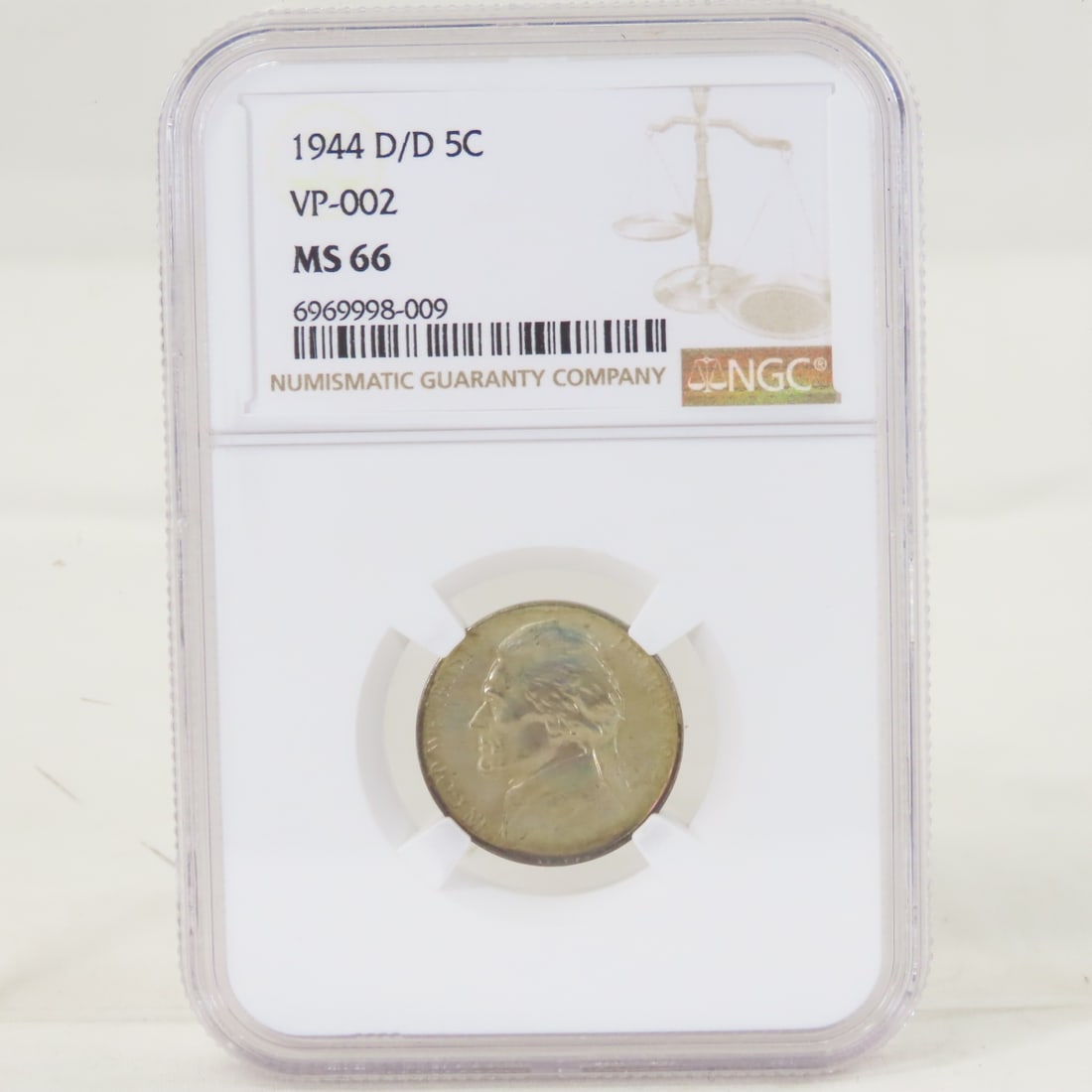 1944 D/D Jefferson War Nickel VP-002 NGC MS 66: 1944 D/D Jefferson War Nickel VP-002 NGC MS 66 - LOT SIZE: 4x3x1" 1 LB All information and photos, which are part of the description, are intended to be as accurate as possible, but errors are possibl