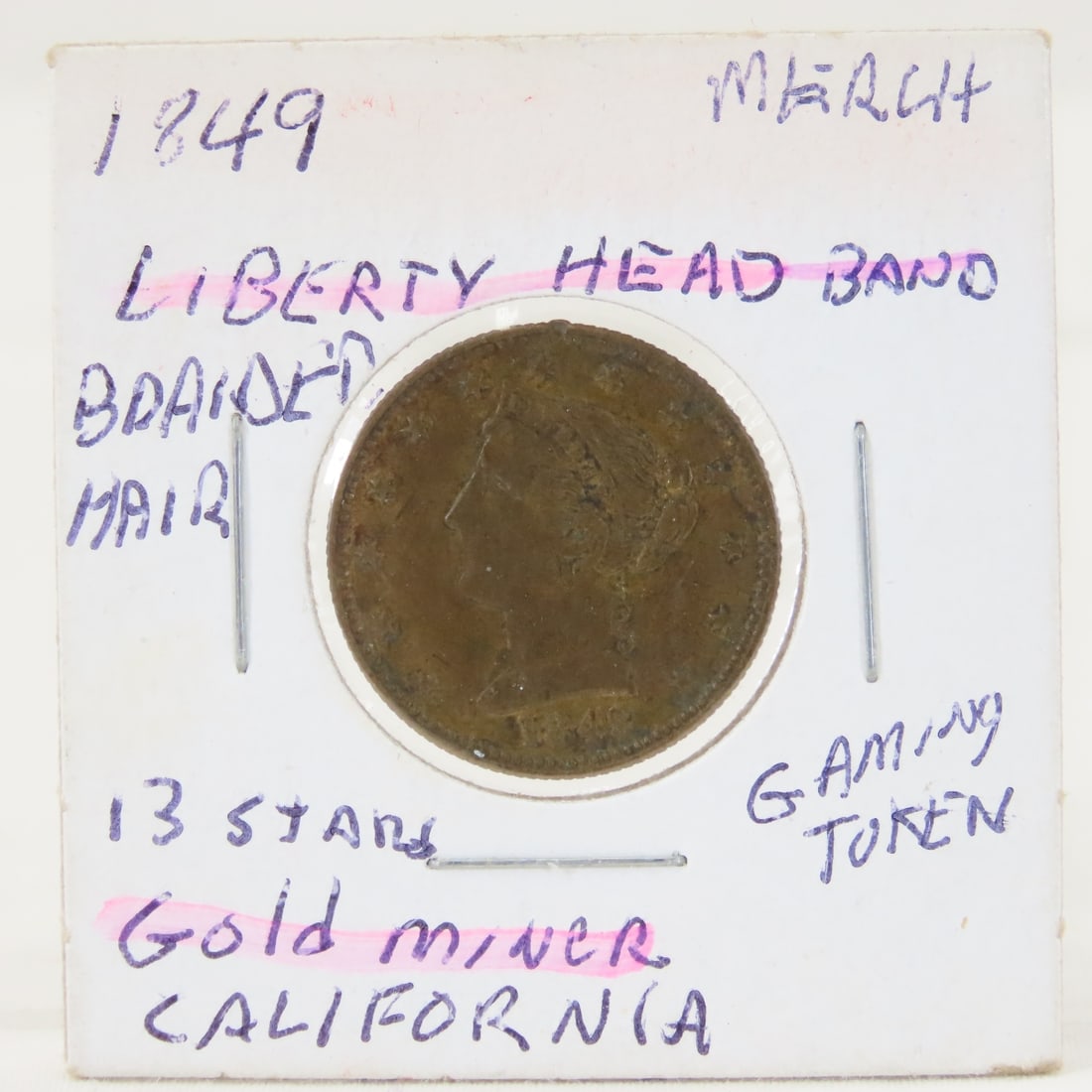 1849 Gaming Token California Gold Miner: 1849 Gaming Token California Gold Miner - Liberty Head/Gold Miner LOT SIZE: 2x2x1" 1 LB All information and photos, which are part of the description, are intended to be as accurate as possible, but