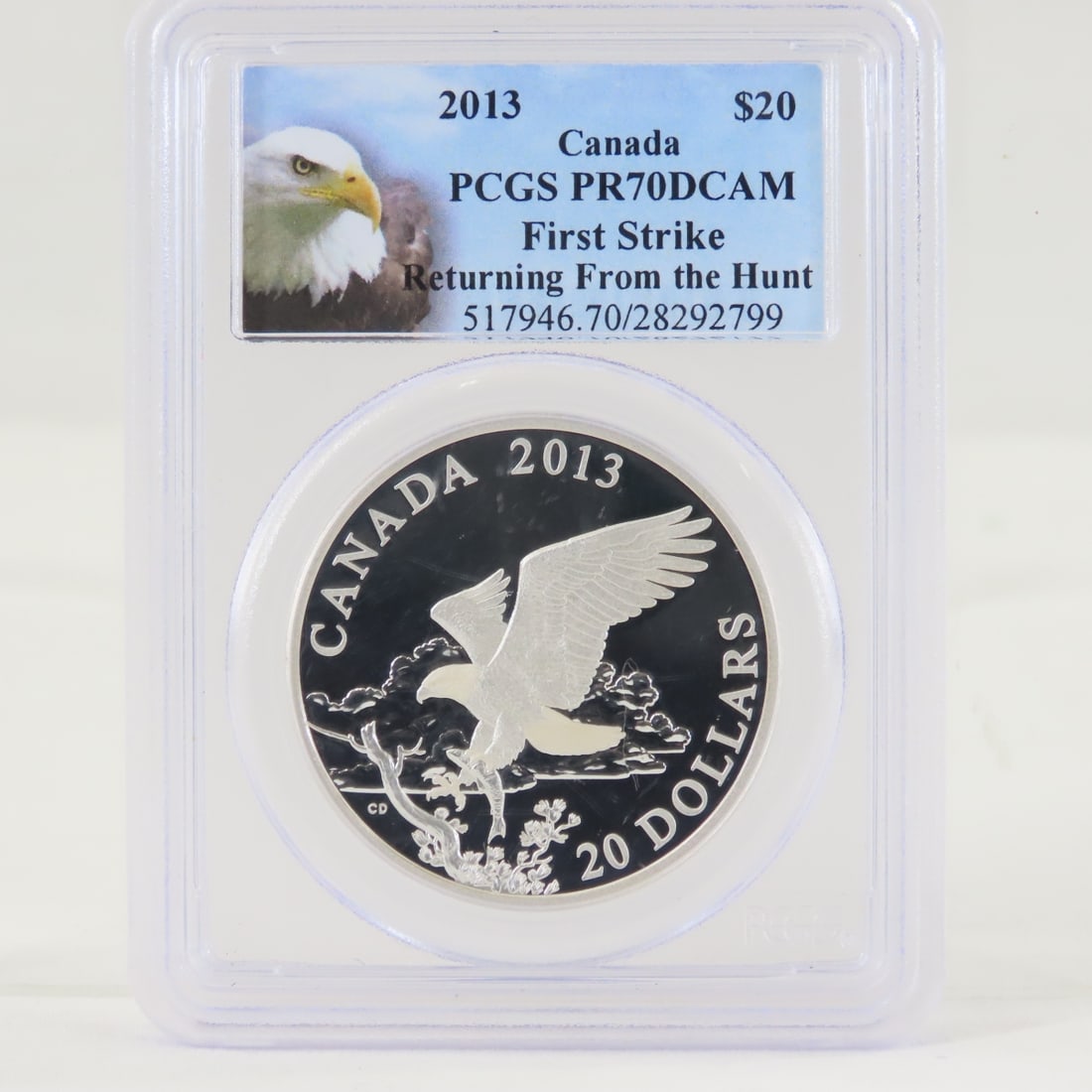 2013 Canada Silver $20 PCGS PR70DCAM First Strike: 2013 Canada Silver $20 PCGS PR70DCAM First Strike - Returning From The Hunt. LOT SIZE: 4x3x1" 1 LB All information and photos, which are part of the description, are intended to be as accurate as