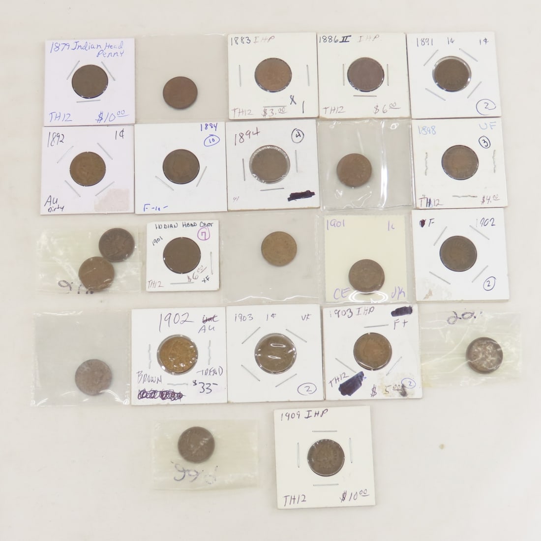 23 Indian Head Cents 1879-1909: 23 Indian Head Cents 1879-1909 - LOT SIZE: 3x2x2" 1 LB All information and photos, which are part of the description, are intended to be as accurate as possible, but errors are possible. No item may