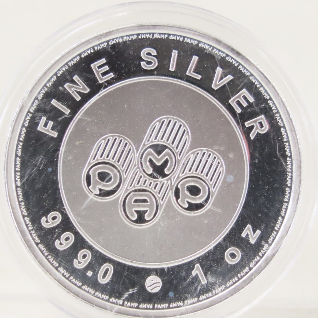 PAMP 1ozt .999 Silver Round: PAMP 1ozt .999 Silver Round - LOT SIZE: 2x2x1" 1 LB All information and photos, which are part of the description, are intended to be as accurate as possible, but errors are possible. No item may be
