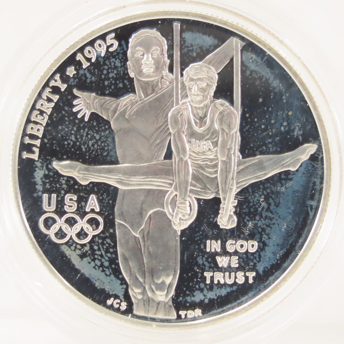 1995 P Atlanta Olympics Proof Silver Dollar: 1995 P Atlanta Olympics Proof Silver Dollar - LOT SIZE: 2x2x1" 1 LB All information and photos, which are part of the description, are intended to be as accurate as possible, but errors are possible. 