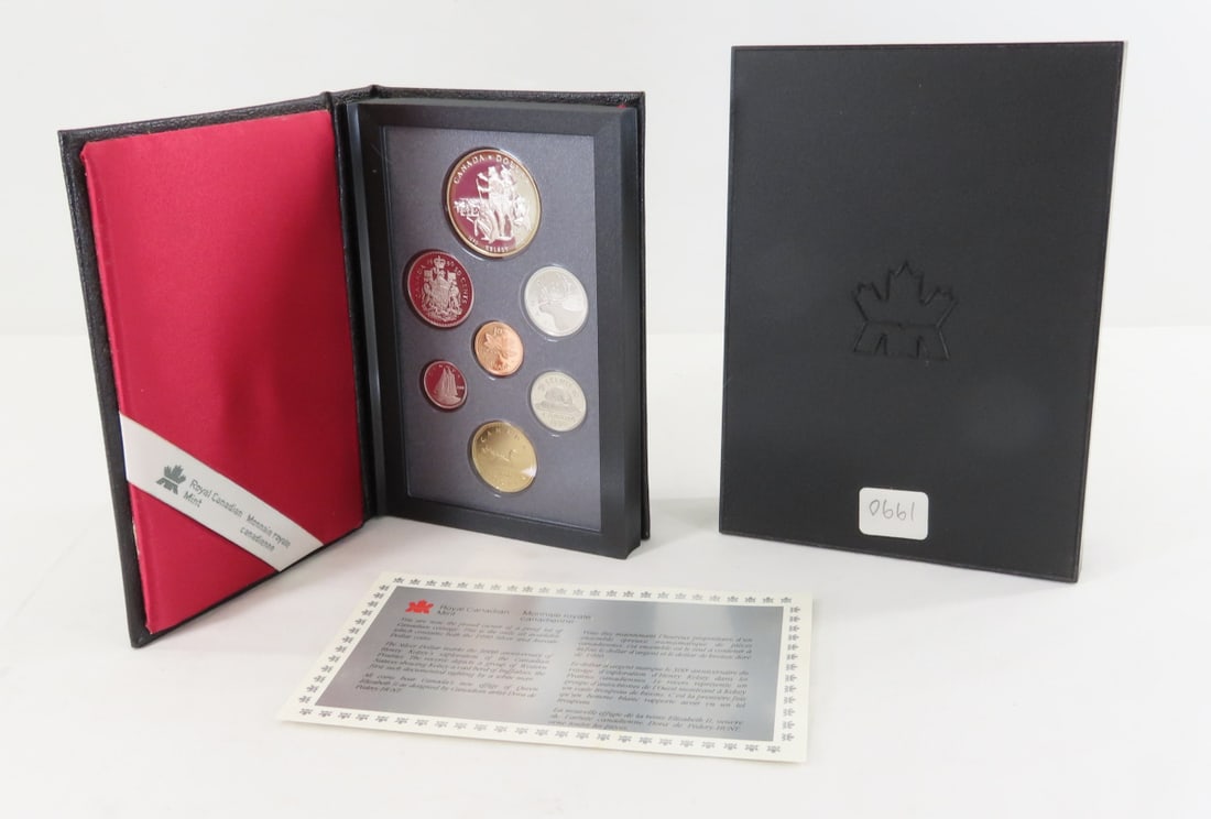 1990 Royal Canadian Mint Double Dollar Proof Set: 1990 Royal Canadian Mint Double Dollar Proof Set - With box and paperwork. 1 Silver Dollar is 50% Silver. LOT SIZE: 7x5x2" 1 LB All information and photos, which are part of the description, are inten