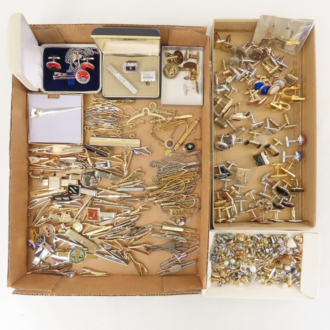 Cufflinks, Tie Bars, Tie Tacs and More: Cufflinks, Tie Bars, Tie Tacs and More - most are paired cufflinks- a handful of singles. LOT SIZE: 10x10x8" 4 LBS All information and photos, which are part of the description, are intended to be as
