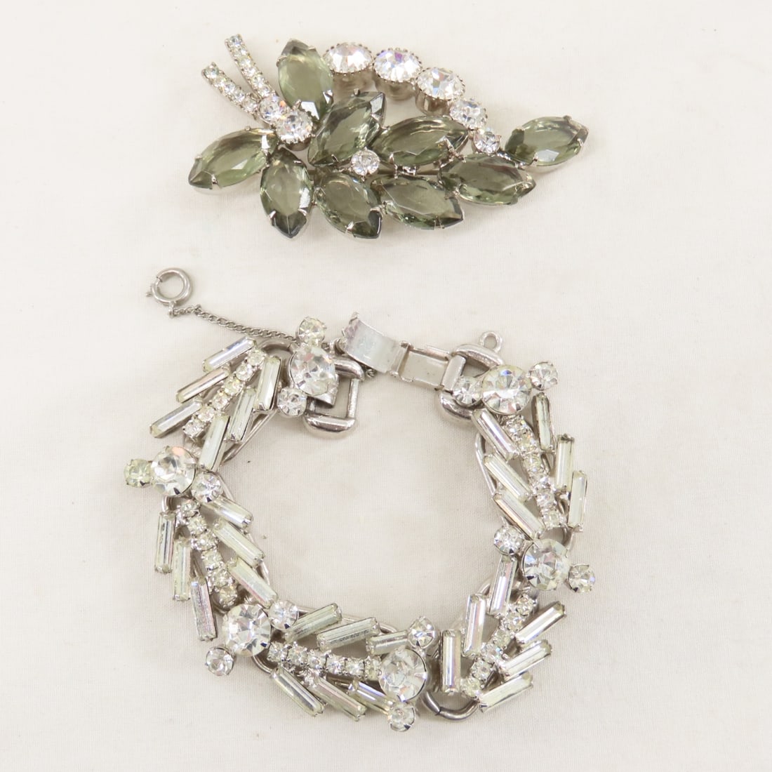Vintage 5 link Juliana Bracelet & Brooch: Vintage 5 link Juliana Bracelet & Brooch - bracelet has clear baguettes & round, unsigned with safety chain - known piece IIJJ-003690. Brooch is gray navettes and clear round stones, known piece IIJJ-