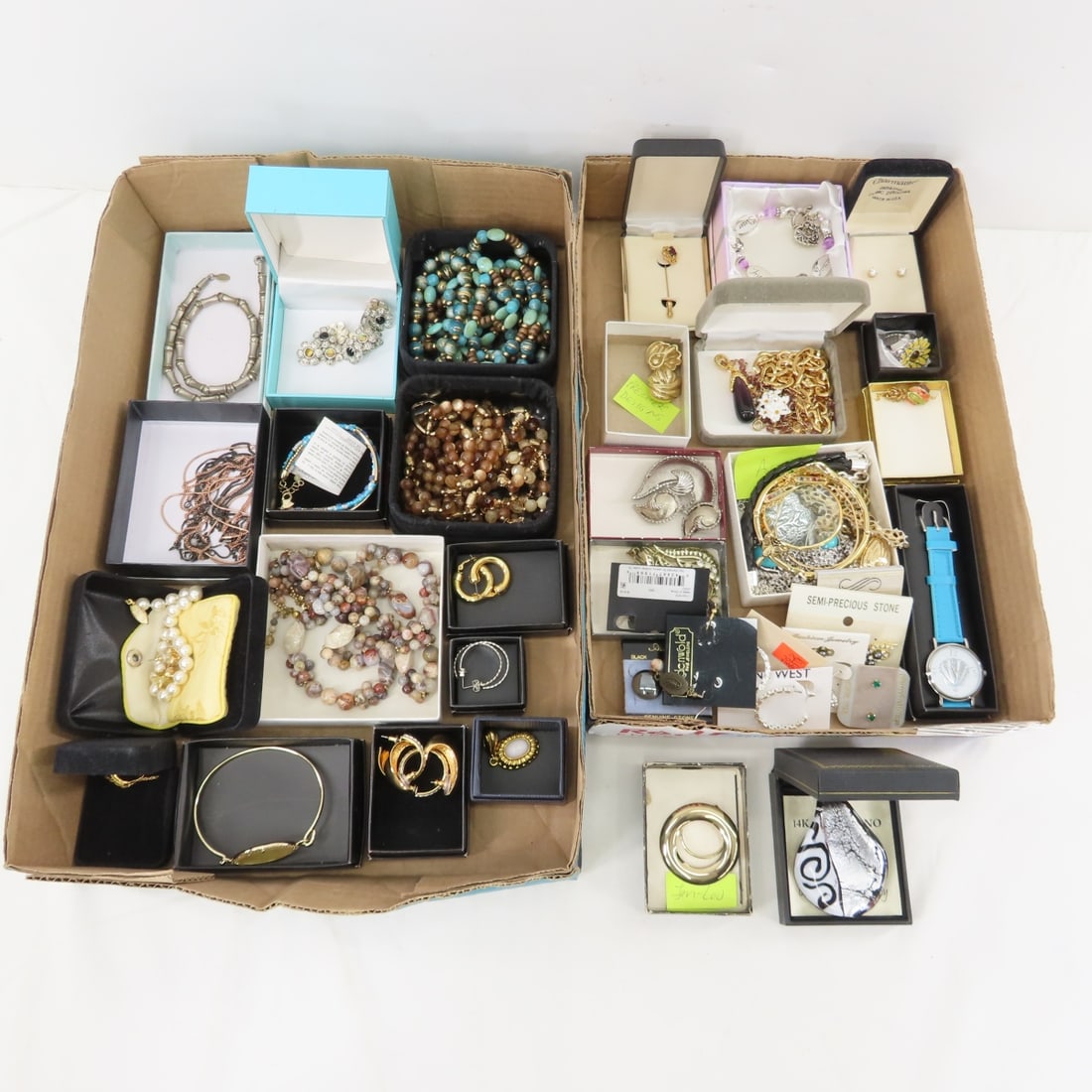 Norman Miller, Avon & Assorted Boxed Jewelry: Norman Miller, Avon & Assorted Boxed Jewelry - Premier Designs and more. LOT SIZE: 12x10x10" 5 LBS All information and photos, which are part of the description, are intended to be as accurate as