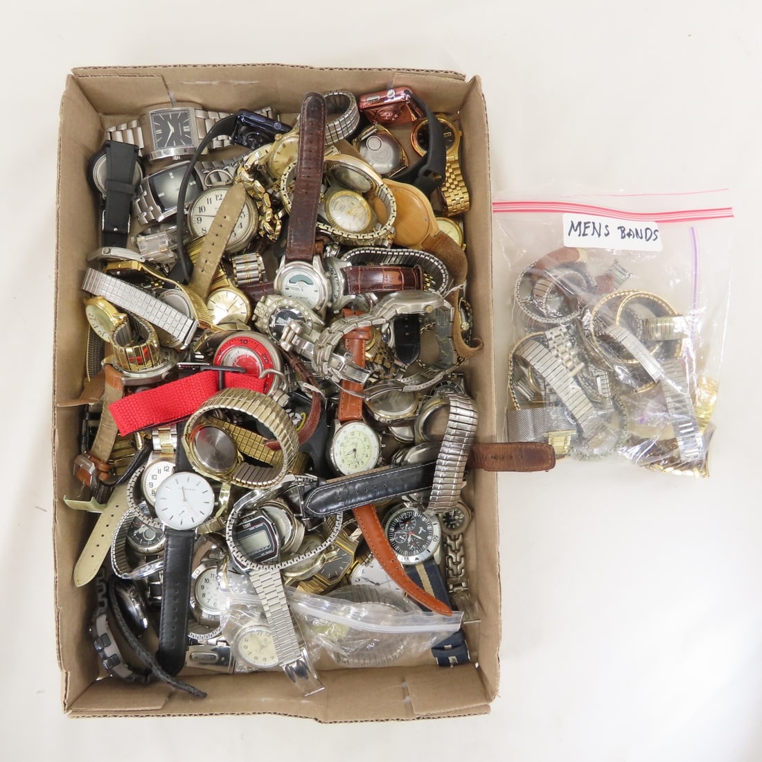 Men's Fashion Wrist & Pocket Watches and Bands: Men's Fashion Wrist & Pocket Watches and Bands - untested. LOT SIZE: 12x12x14" 13 LBS All information and photos, which are part of the description, are intended to be as accurate as possible, but