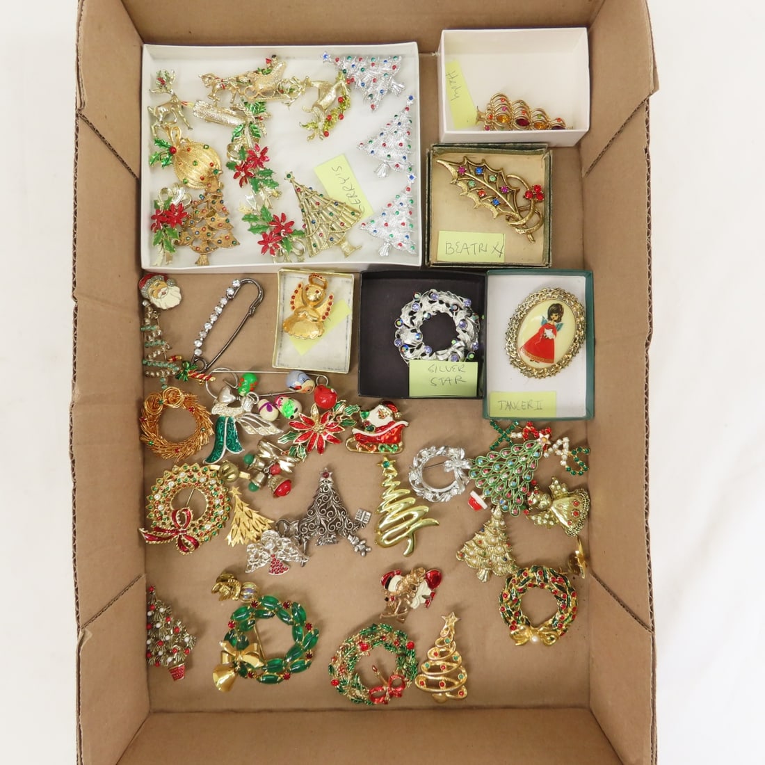 40+ Christmas Brooches Including 19 signed: 40+ Christmas Brooches Including 19 signed - 13 Gerry's, Hedy, Beatrix, LRA, Silver Star, Tancer II, and others. LOT SIZE: 7x7x7" 2 LBS All information and photos, which are part of the description,